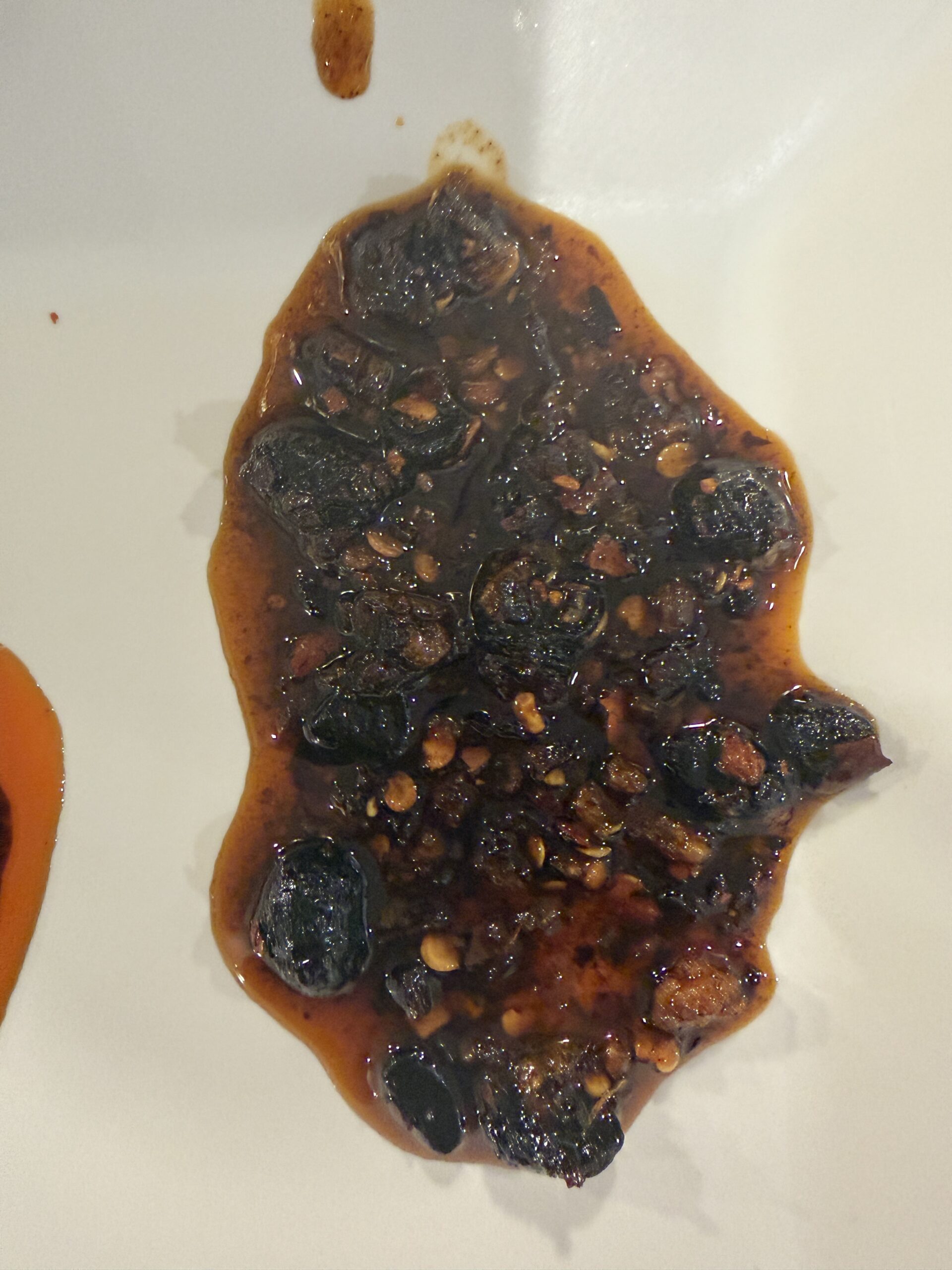 Fly By Jing Sichuan Chili Crisp Original jar close-up — Flavor Index Lab