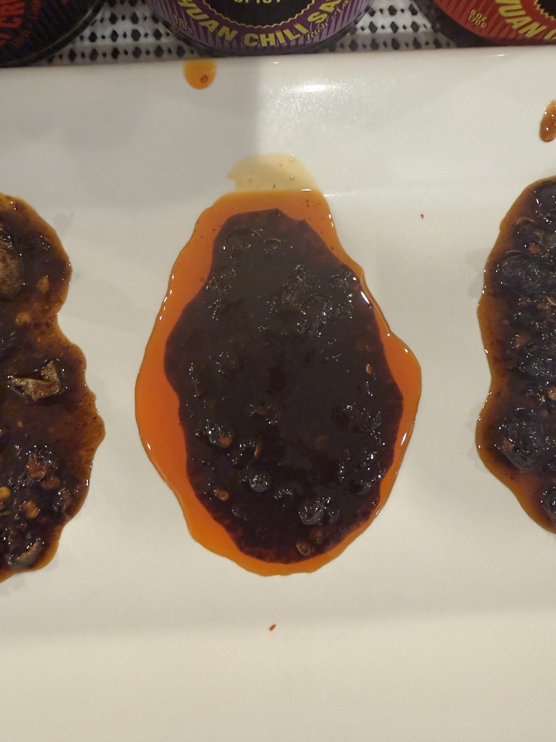 Fly By Jing Sweet and Spicy sauce jar close-up — Flavor Index Lab