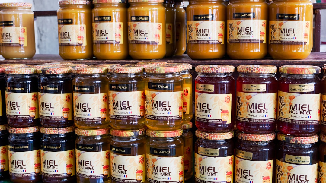 Variety of chili crisp jars on a shelf — most brands are vegan by default — Flavor Index Lab