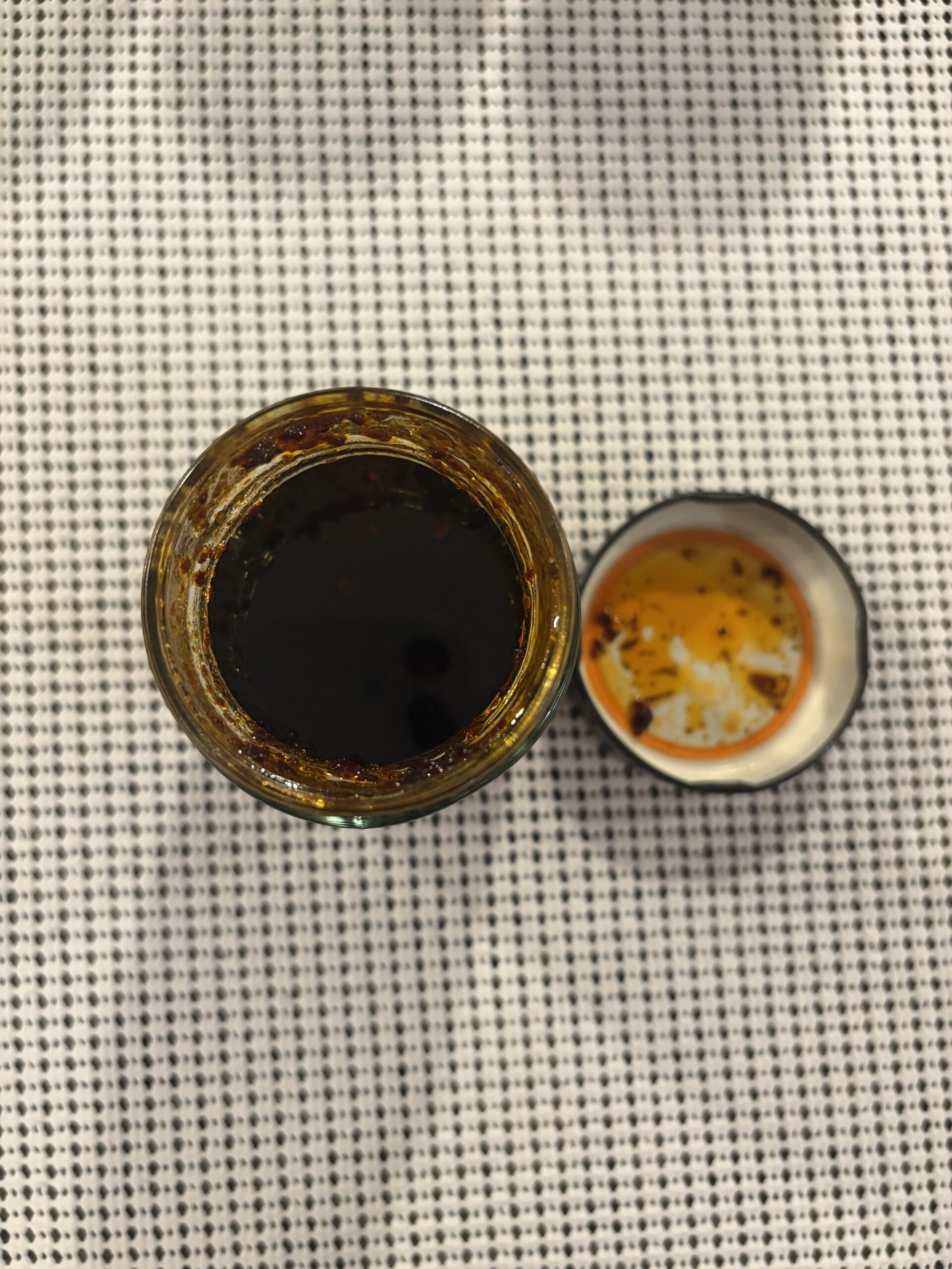 Fly By Jing Sweet and Spicy chili sauce open jar top view — Flavor Index Lab
