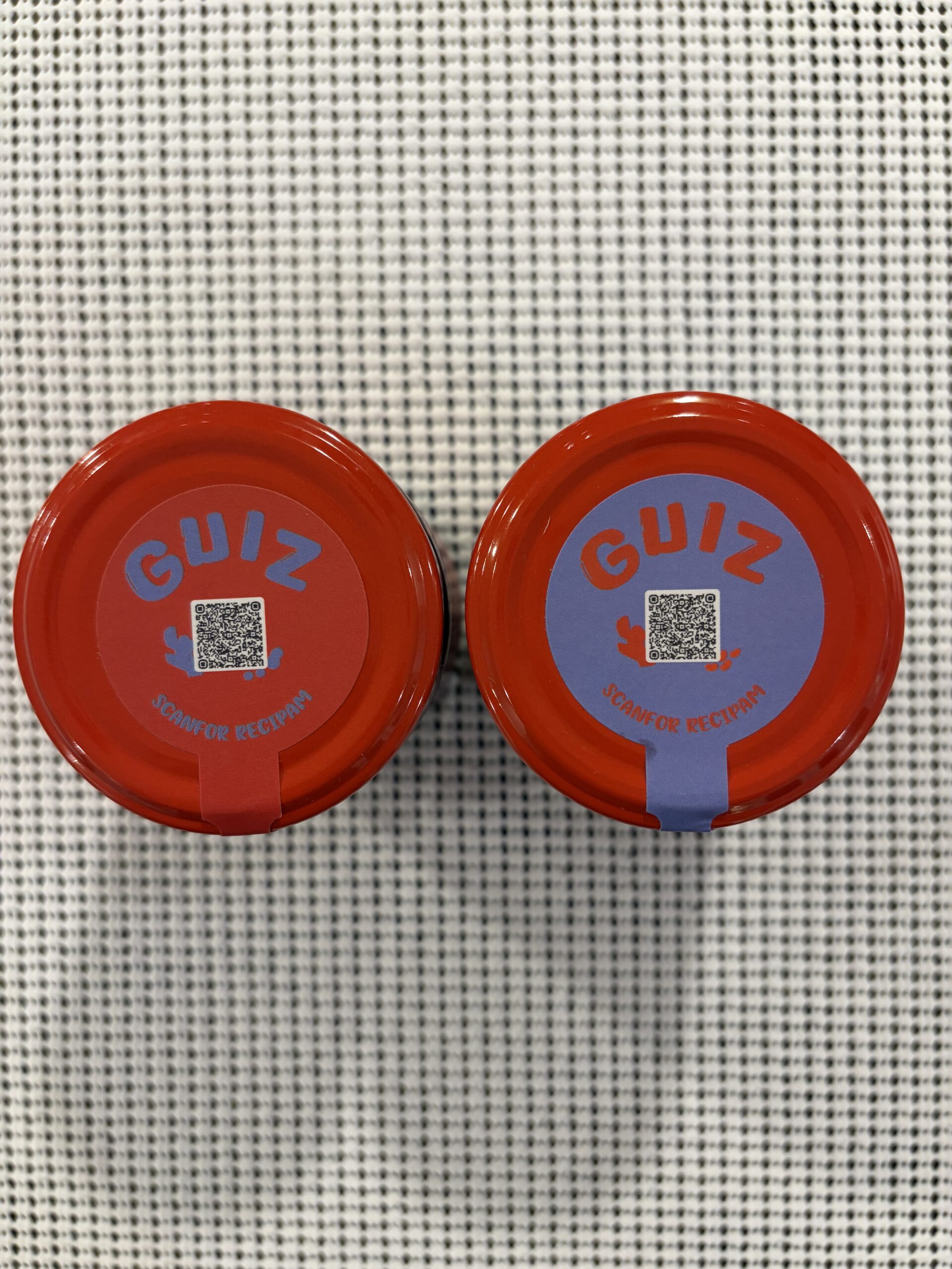 GUIZ Original and Black Bean chili crisp jars side by side — Flavor Index Lab