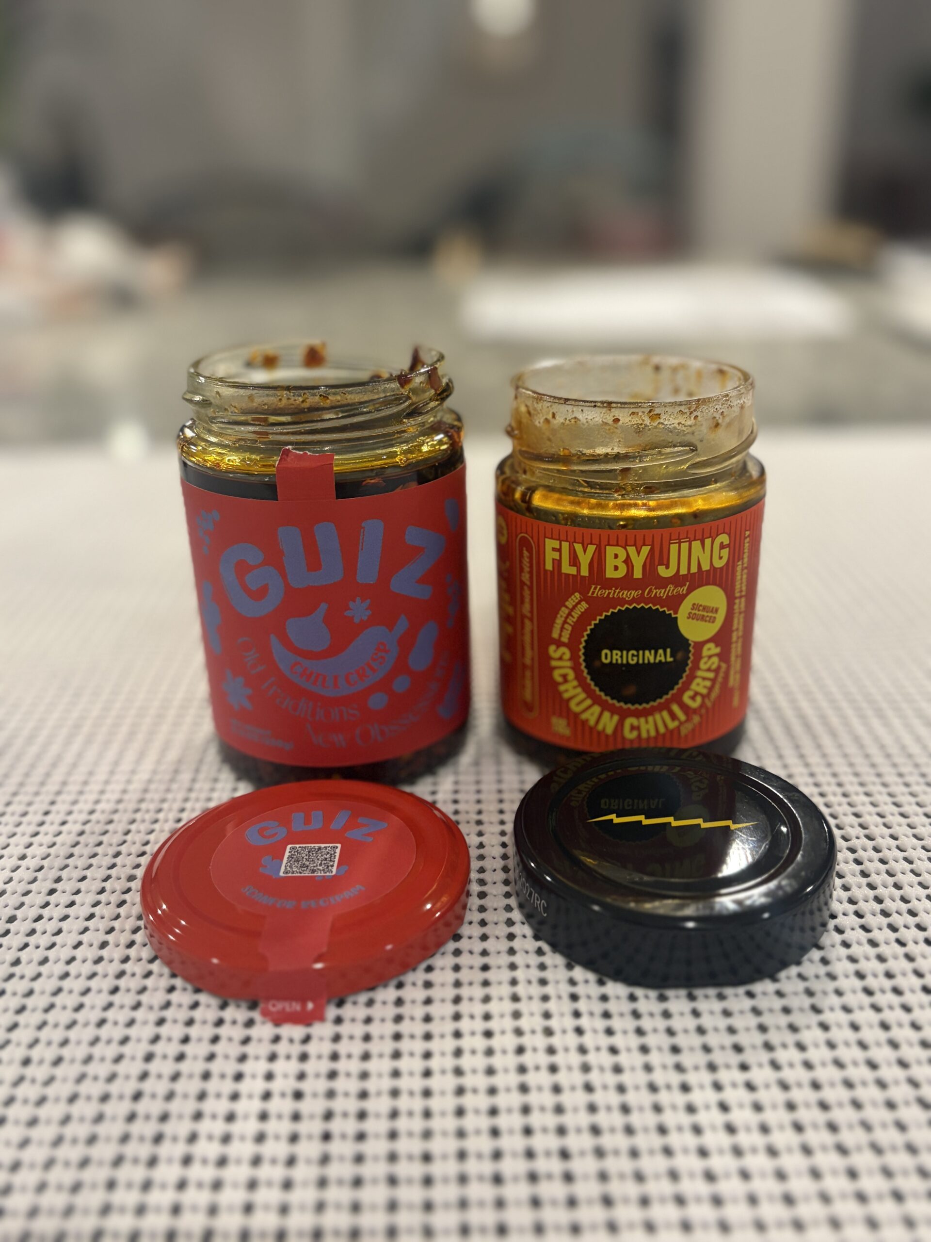 GUIZ and Fly By Jing chili crisp jar labels compared — Flavor Index Lab