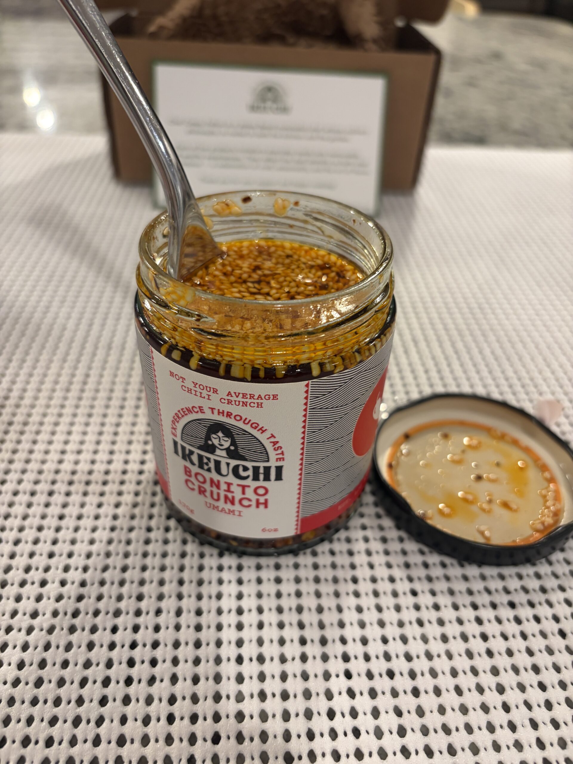Fork resting on Ikeuchi Bonito Crunch chili crisp solids — Flavor Index Lab