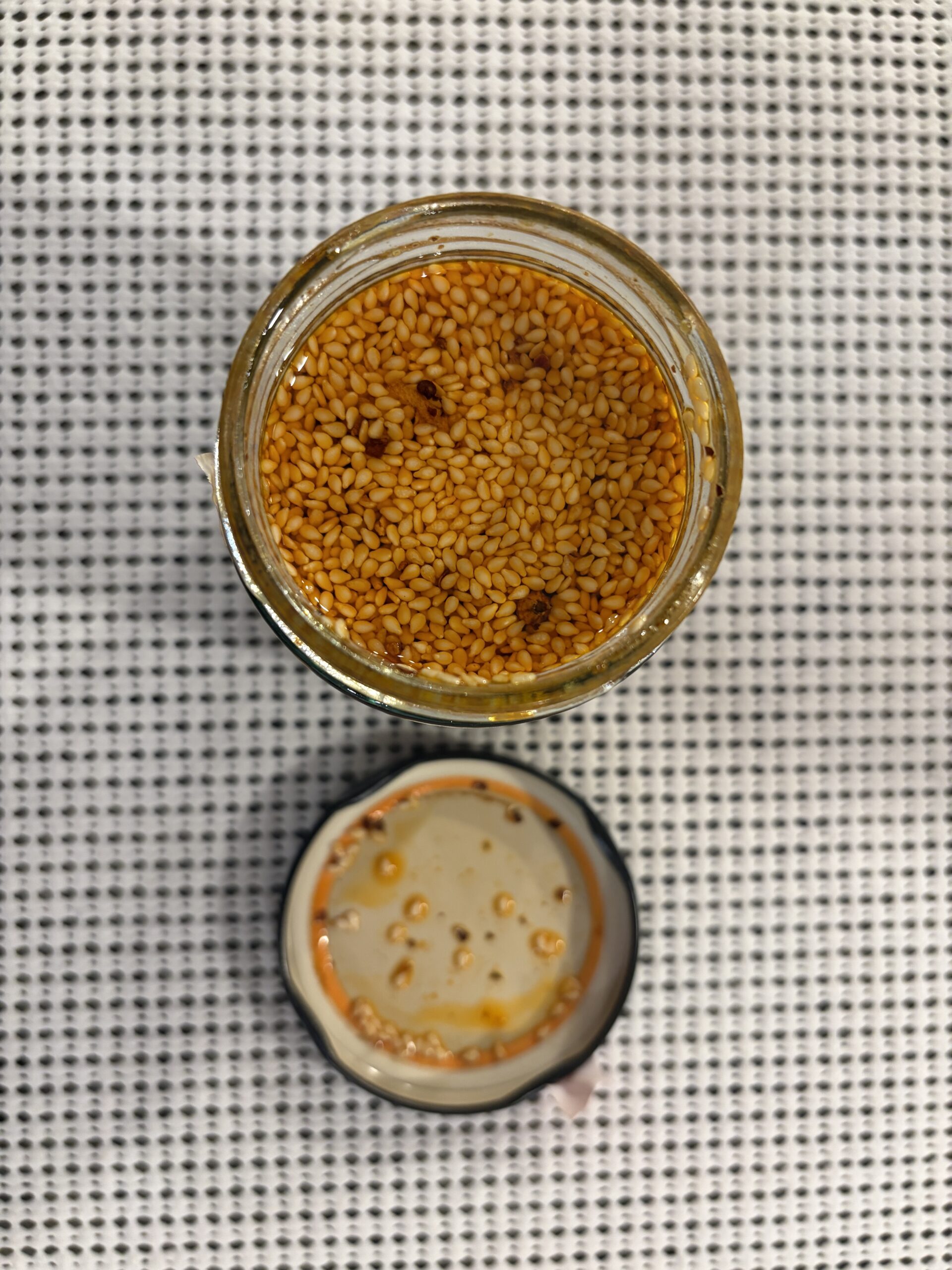 Ikeuchi Bonito Crunch chili crisp open jar with sesame seeds — Flavor Index Lab