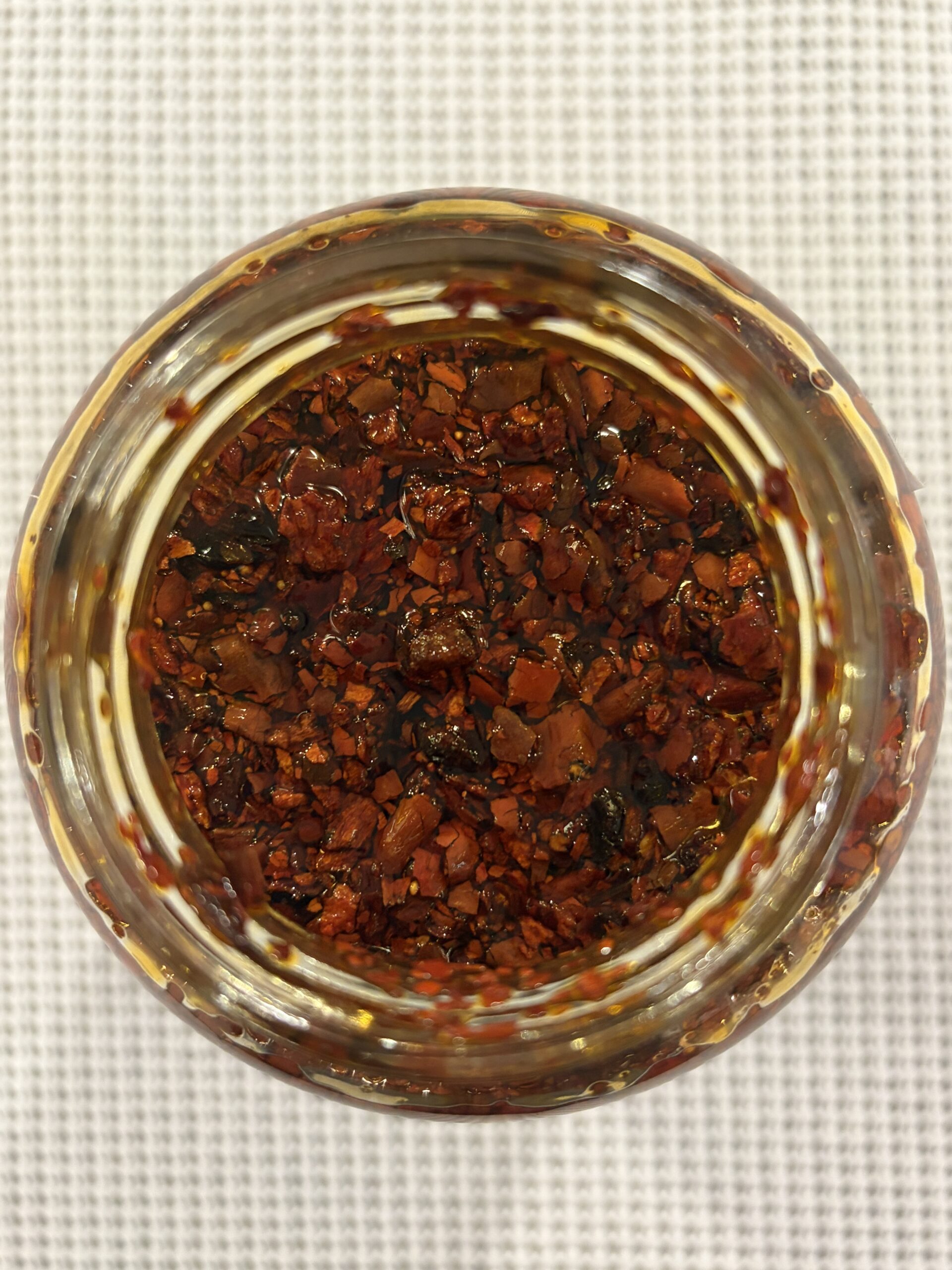 Lao Gan Ma chili crisp open jar top-down — Flavor Index Lab