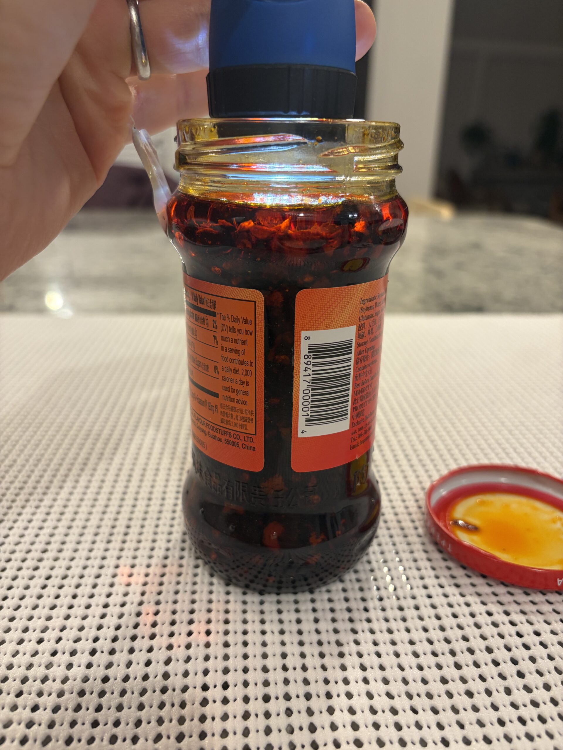 Lao Gan Ma Fermented Soybeans chili oil settlement showing dense solids — Flavor Index Lab