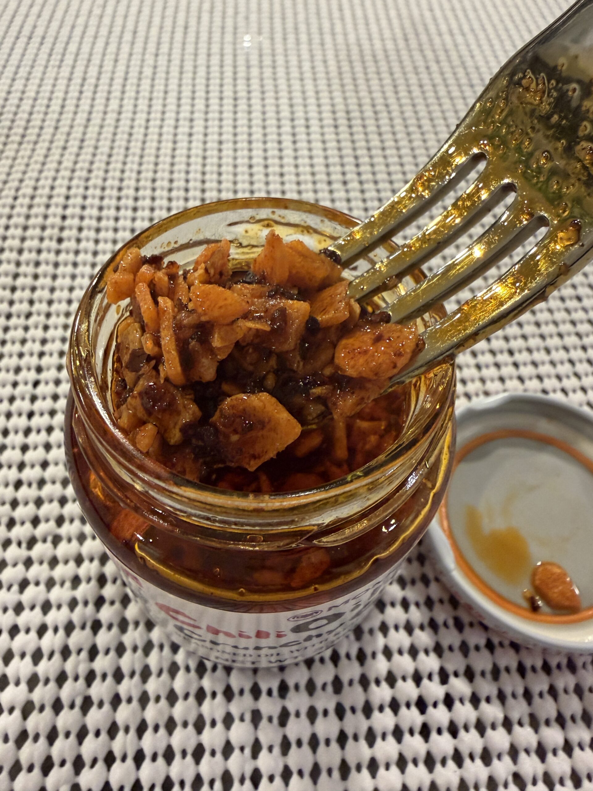 Momoya chili oil fork pull with fried garlic bits — Flavor Index Lab