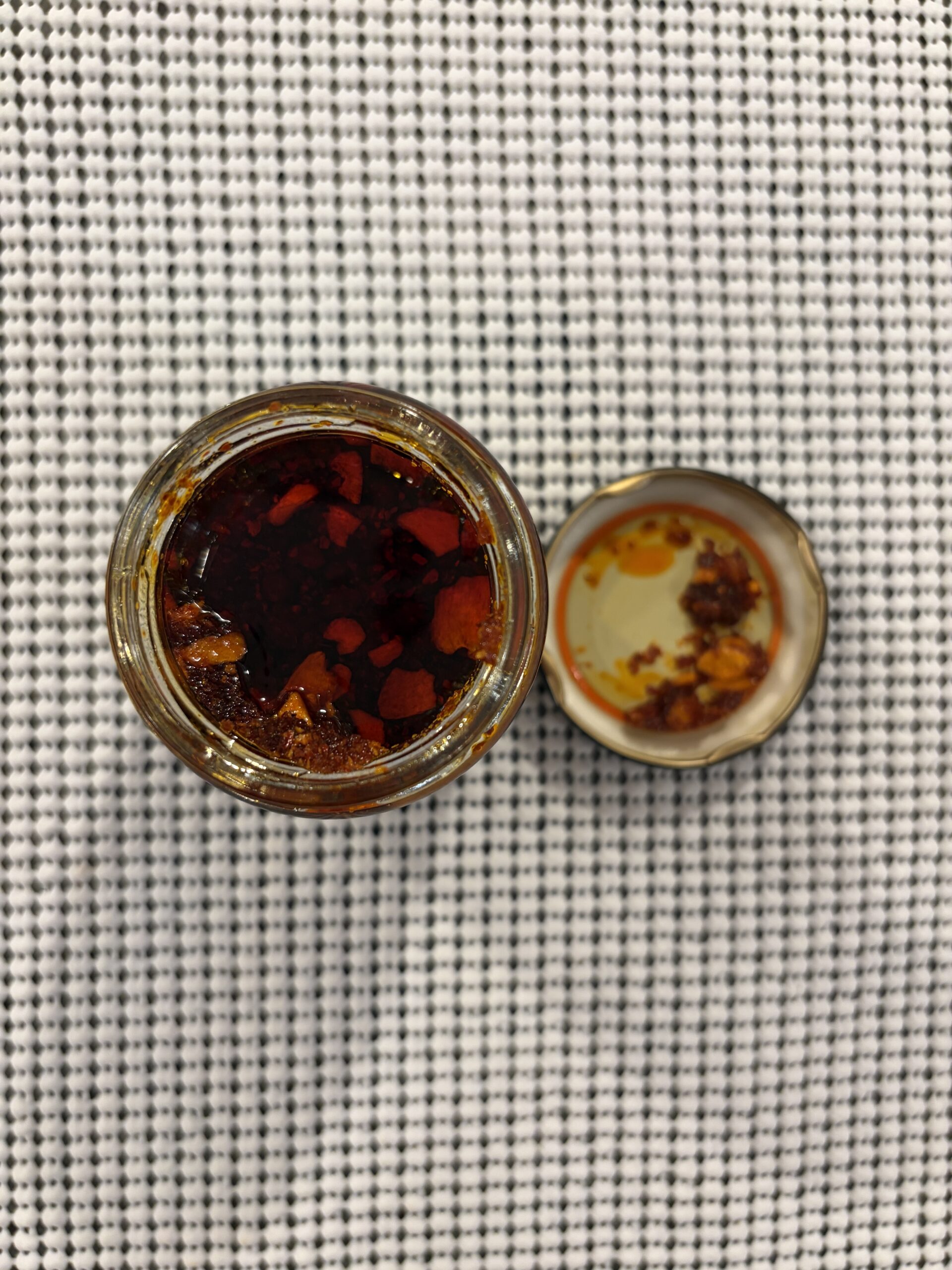 S&B Crunchy Garlic chili crisp open jar showing garlic and chili flakes — Flavor Index Lab