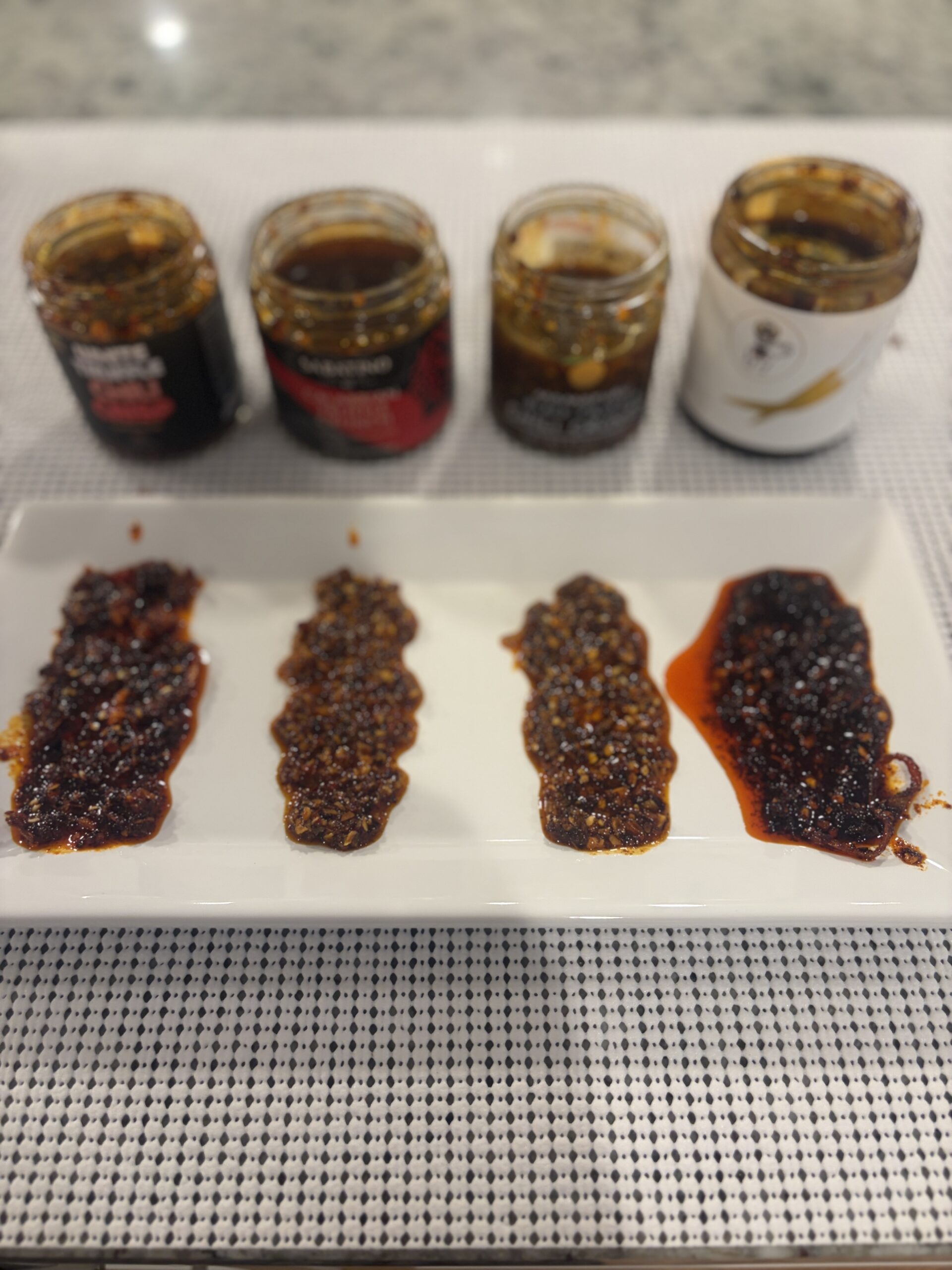 Truffle chili crisp comparison — all four products side by side — Flavor Index Lab