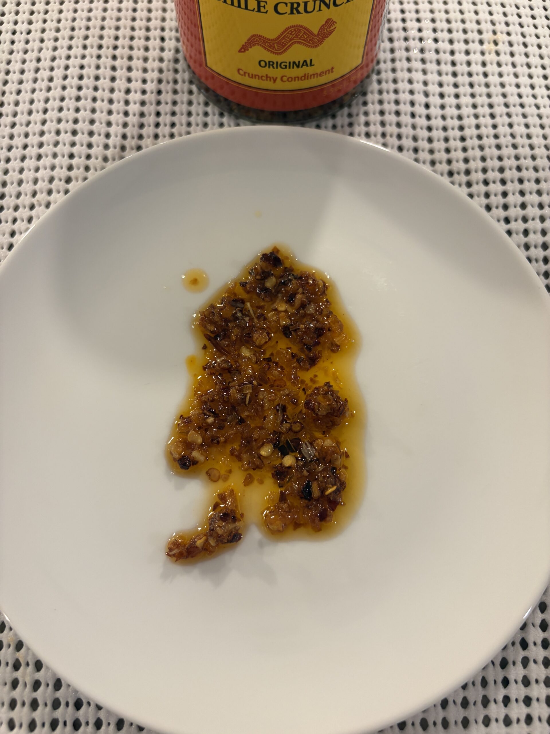 Chile Crunch Original chili crisp on white plate — Flavor Index Lab