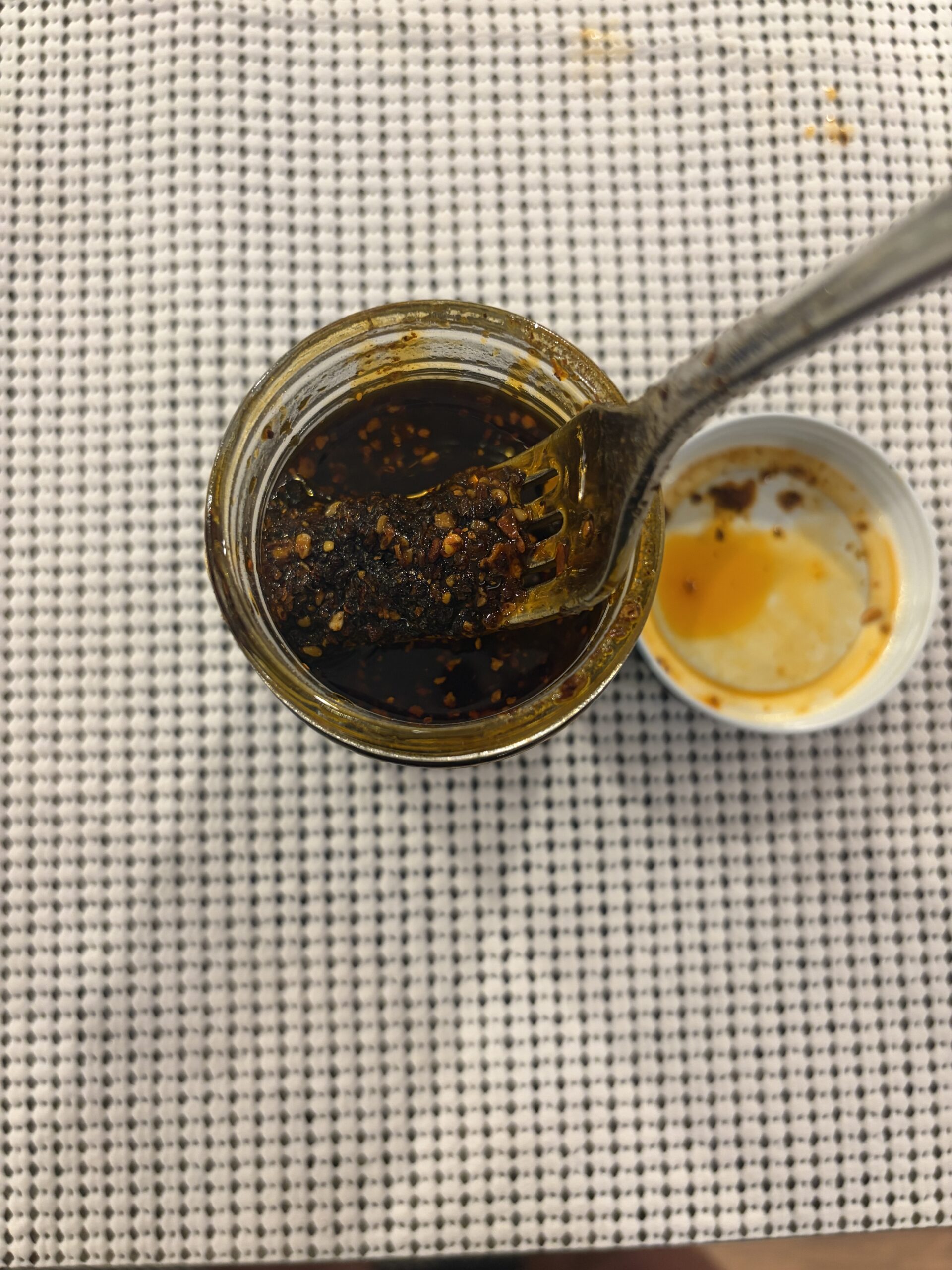 Don Chilio Chipotle Salsa Macha after stirring showing drizzleable consistency . Flavor Index Lab