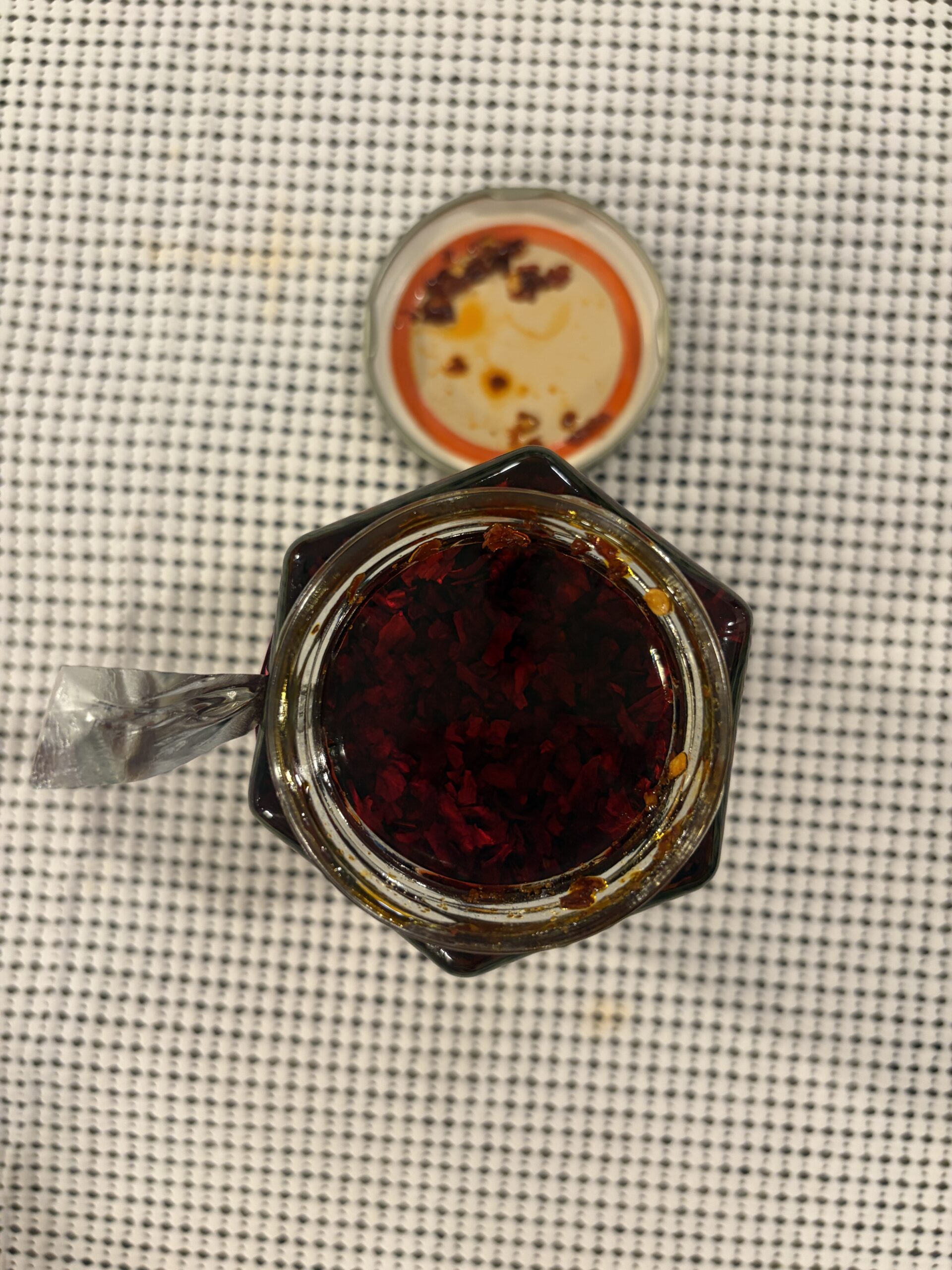 Don Emilio Extra Hot salsa macha open jar showing chilies and seeds — Flavor Index Lab