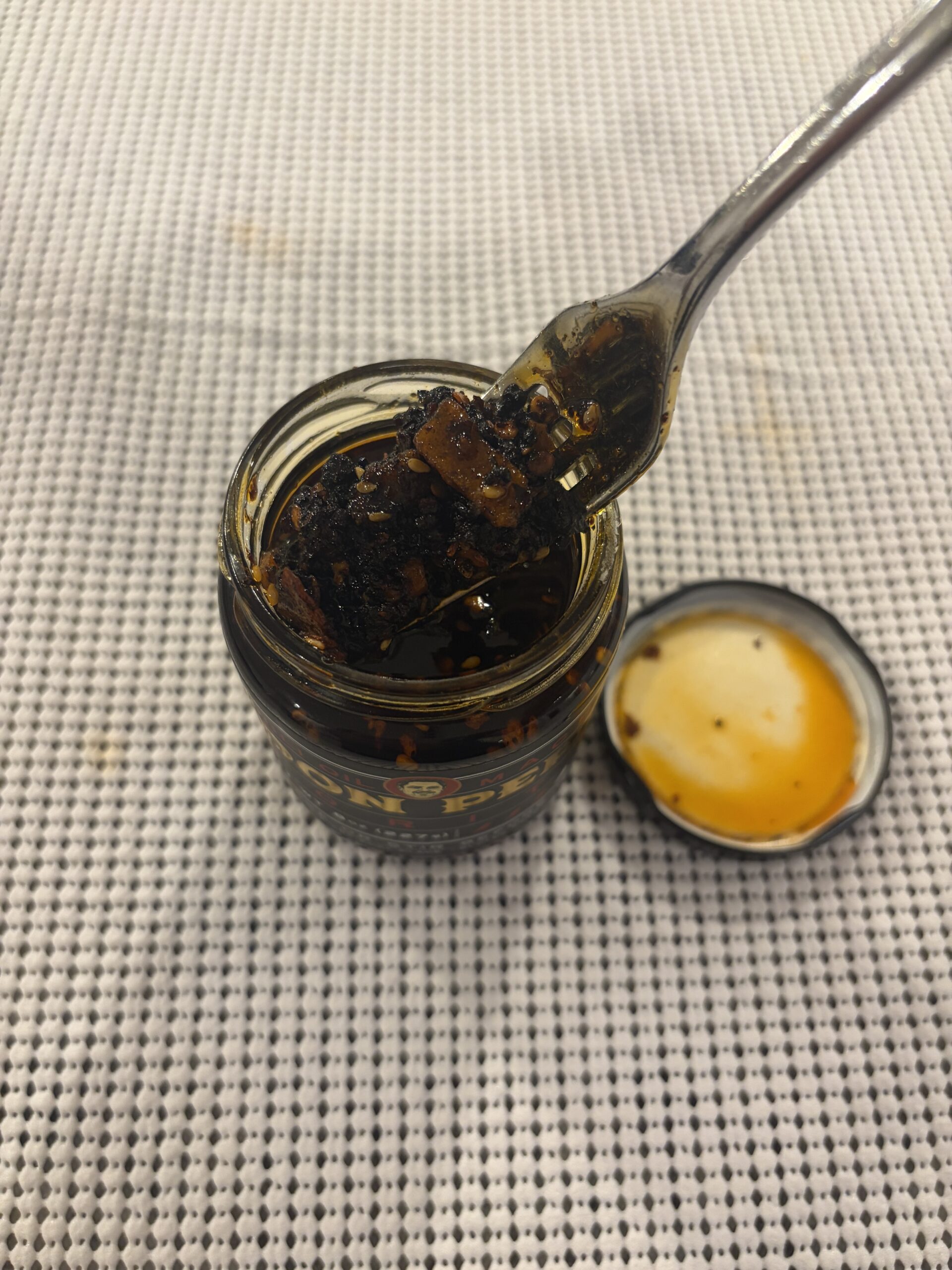 Don Pepe chili oil macha fork pull showing thick texture — Flavor Index Lab