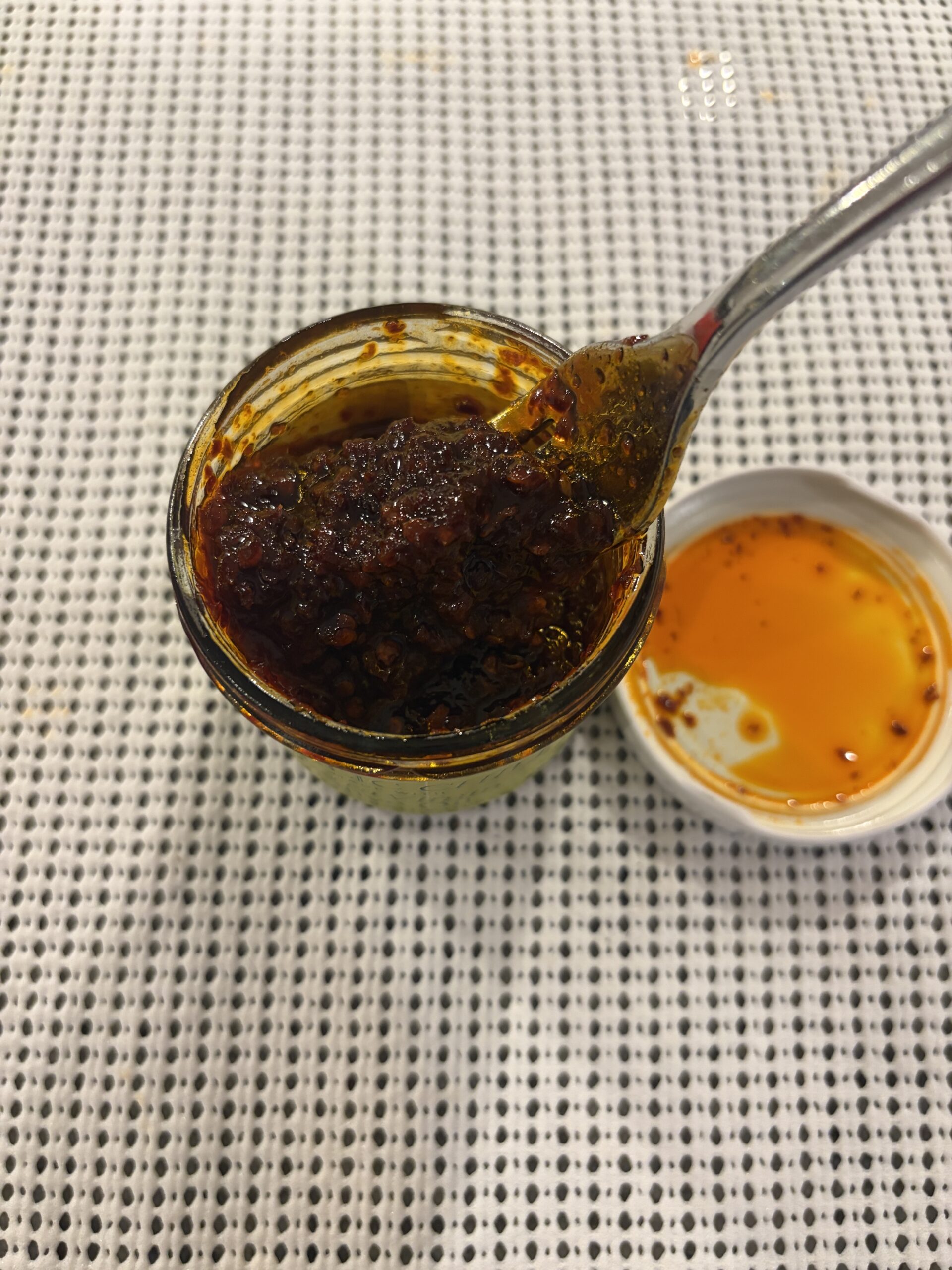 Everiday garlic chili oil fork pull showing paste-like texture — Flavor Index Lab