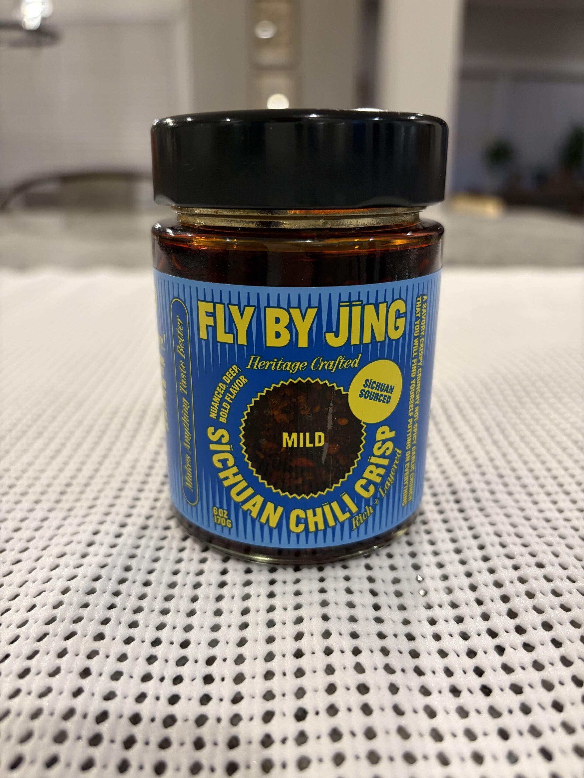 Fly By Jing Mild Review — Fly By Jing Mild chili crisp jar with blue label — Flavor Index Lab