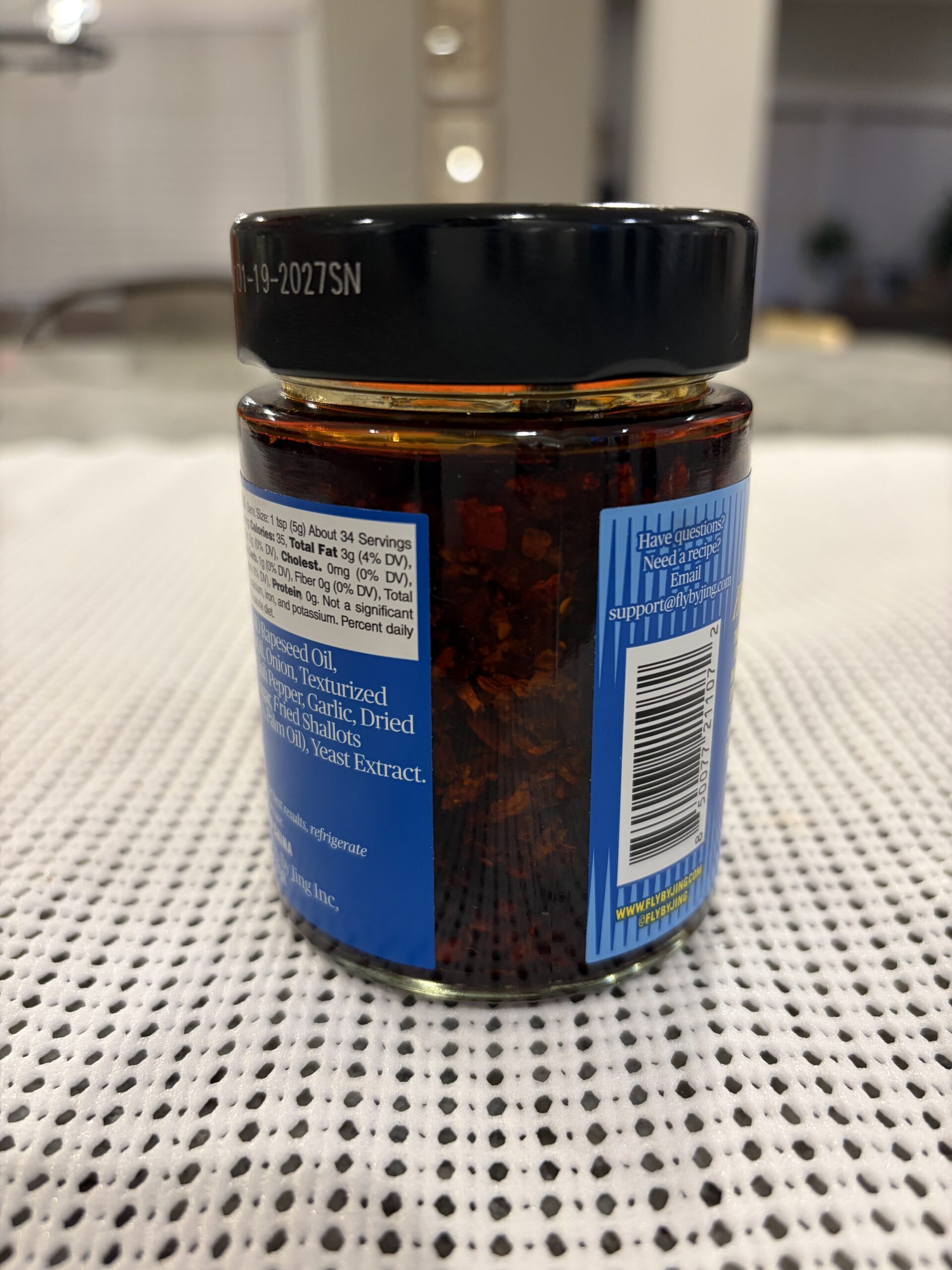 Fly By Jing Mild chili crisp settlement showing solids to the top — Flavor Index Lab