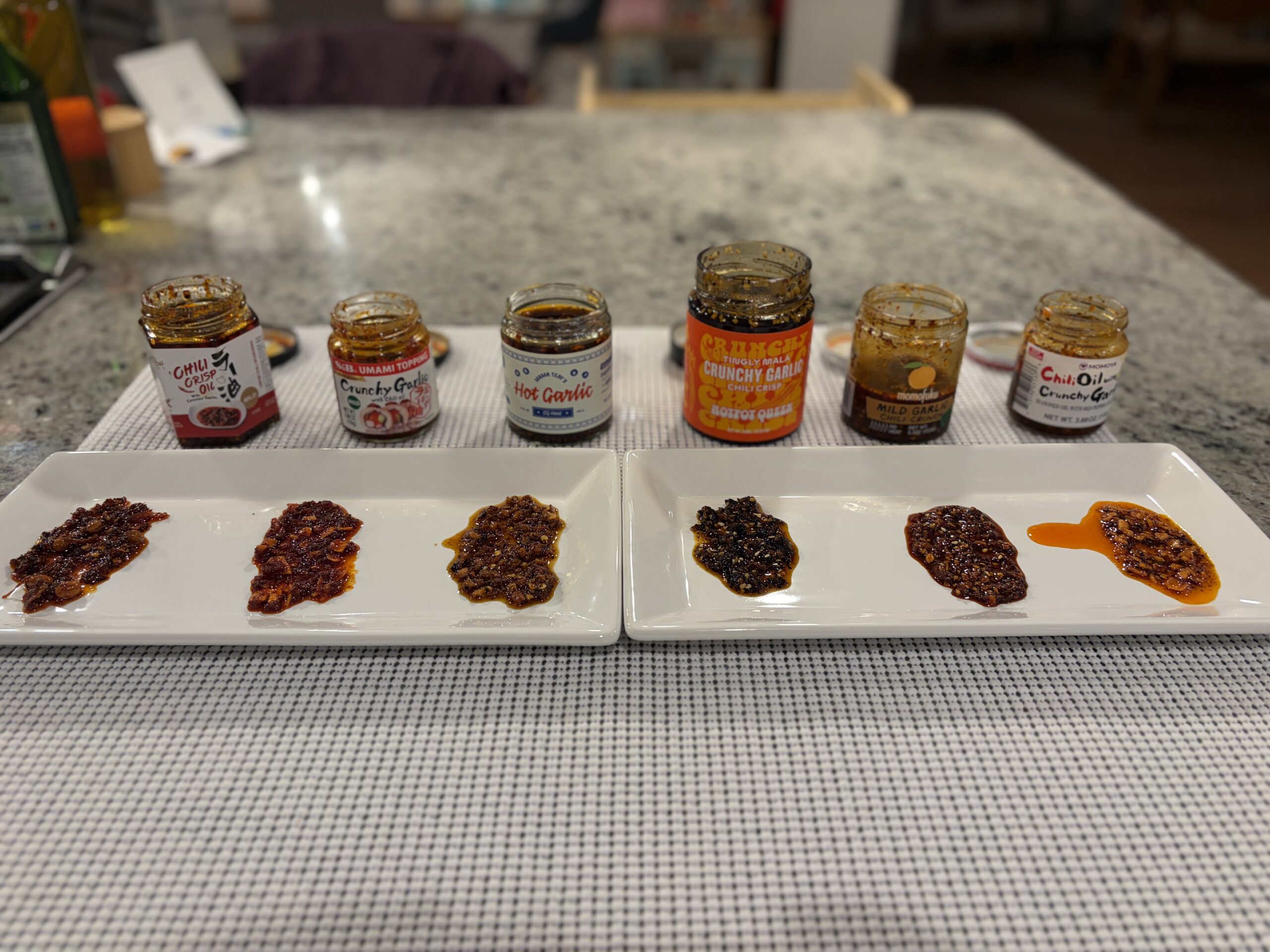 Multiple chili crisp jars compared side by side — Flavor Index Lab