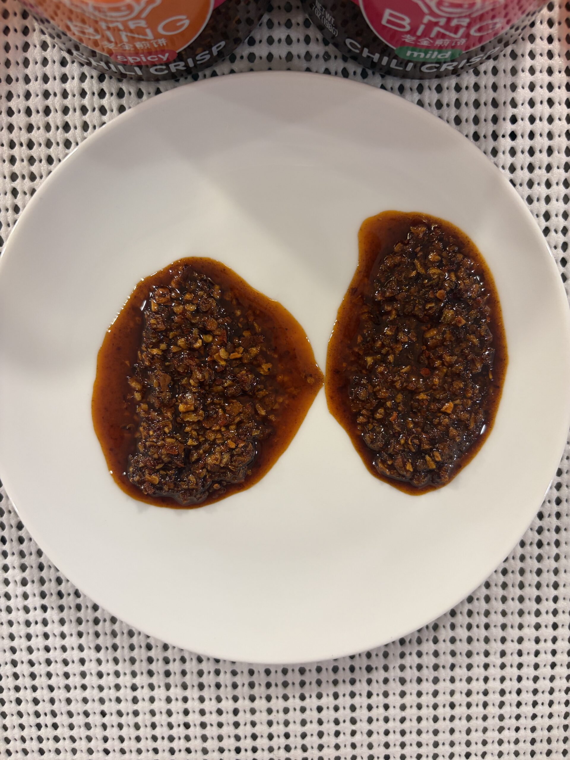 Mr. Bing mild and spicy chili crisp plated top-down comparison — Flavor Index Lab