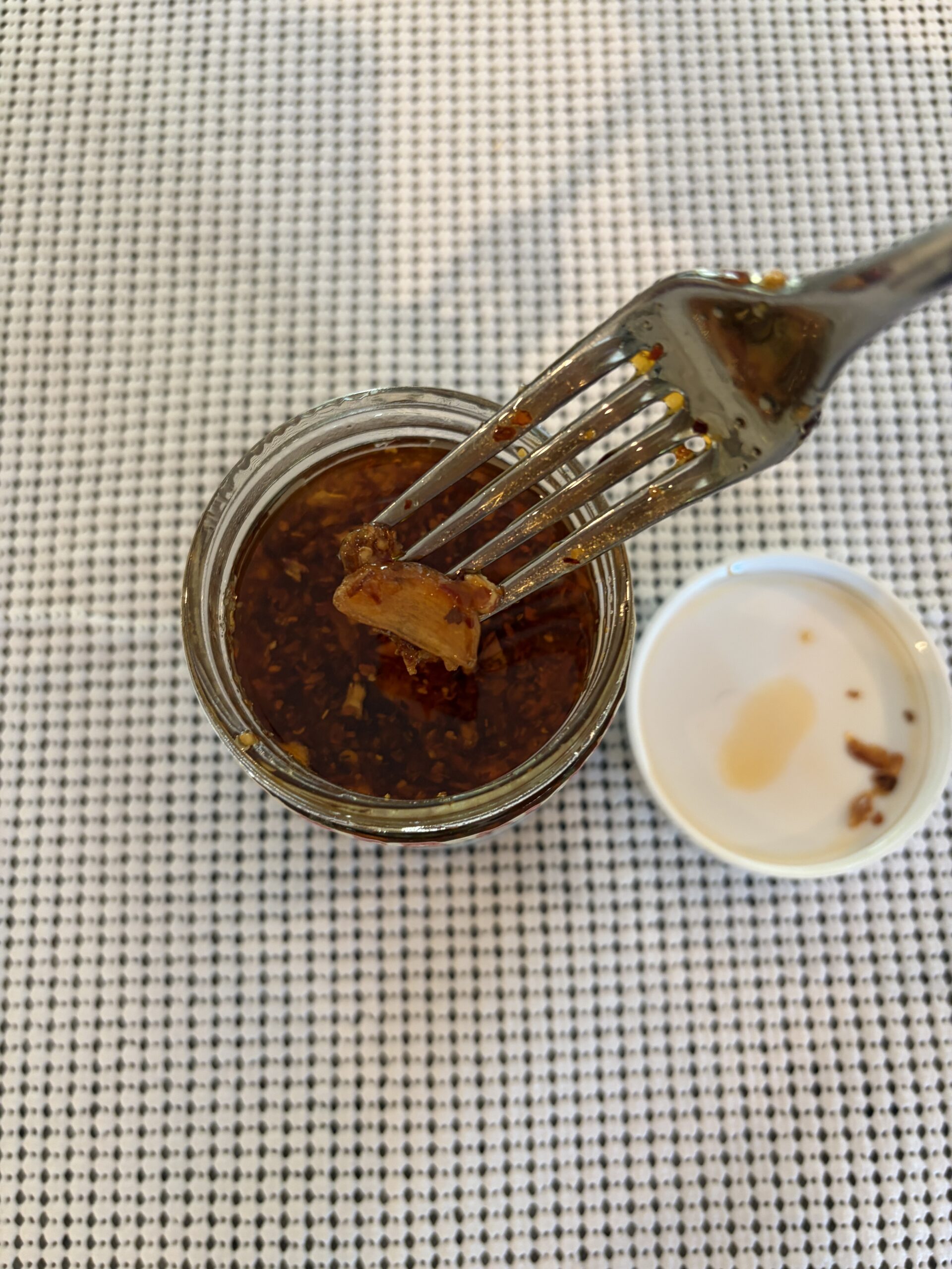Red Clay chili crisp garlic chunks closeup — Flavor Index Lab