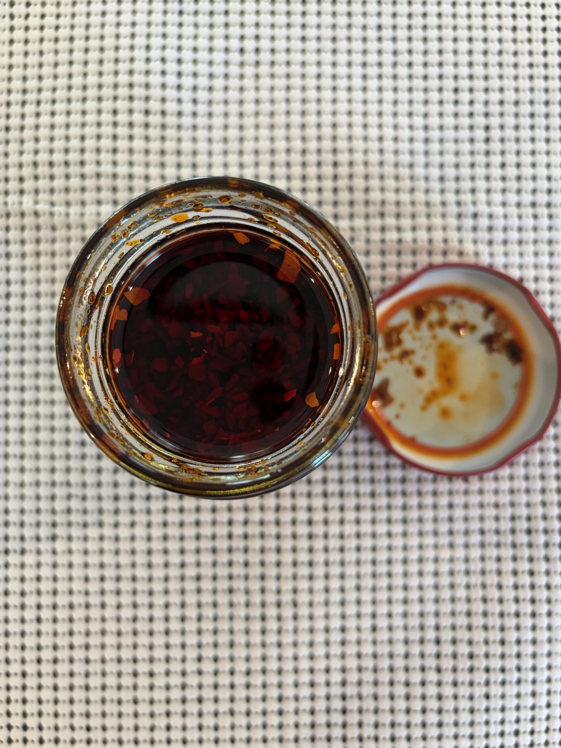 Redbloom Aroma chili crisp open jar showing chili flakes and oil — Flavor Index Lab