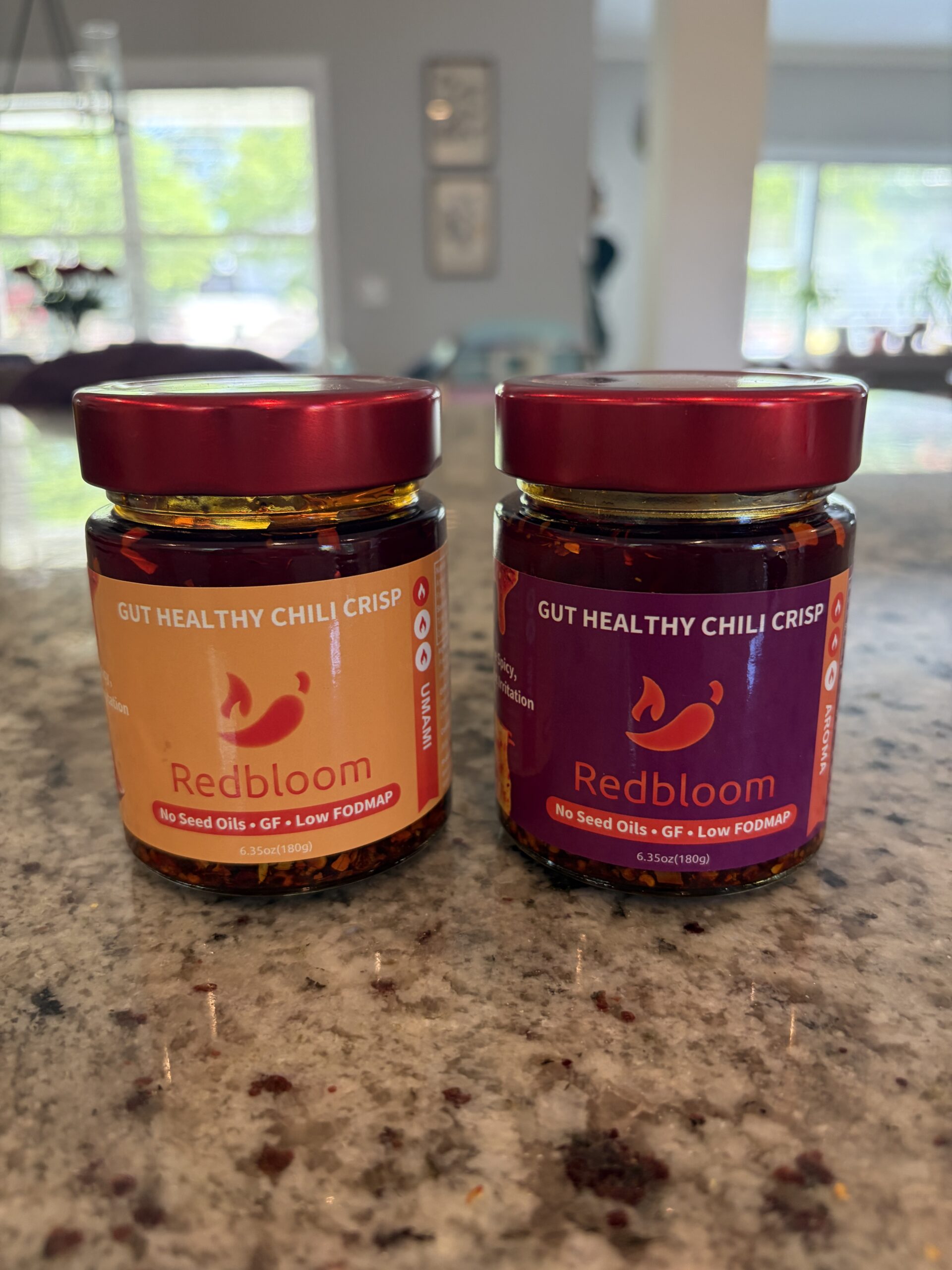 Redbloom Chili Crisp Comparison — Redbloom Aroma and Umami chili crisp jars side by side — Flavor Index Lab