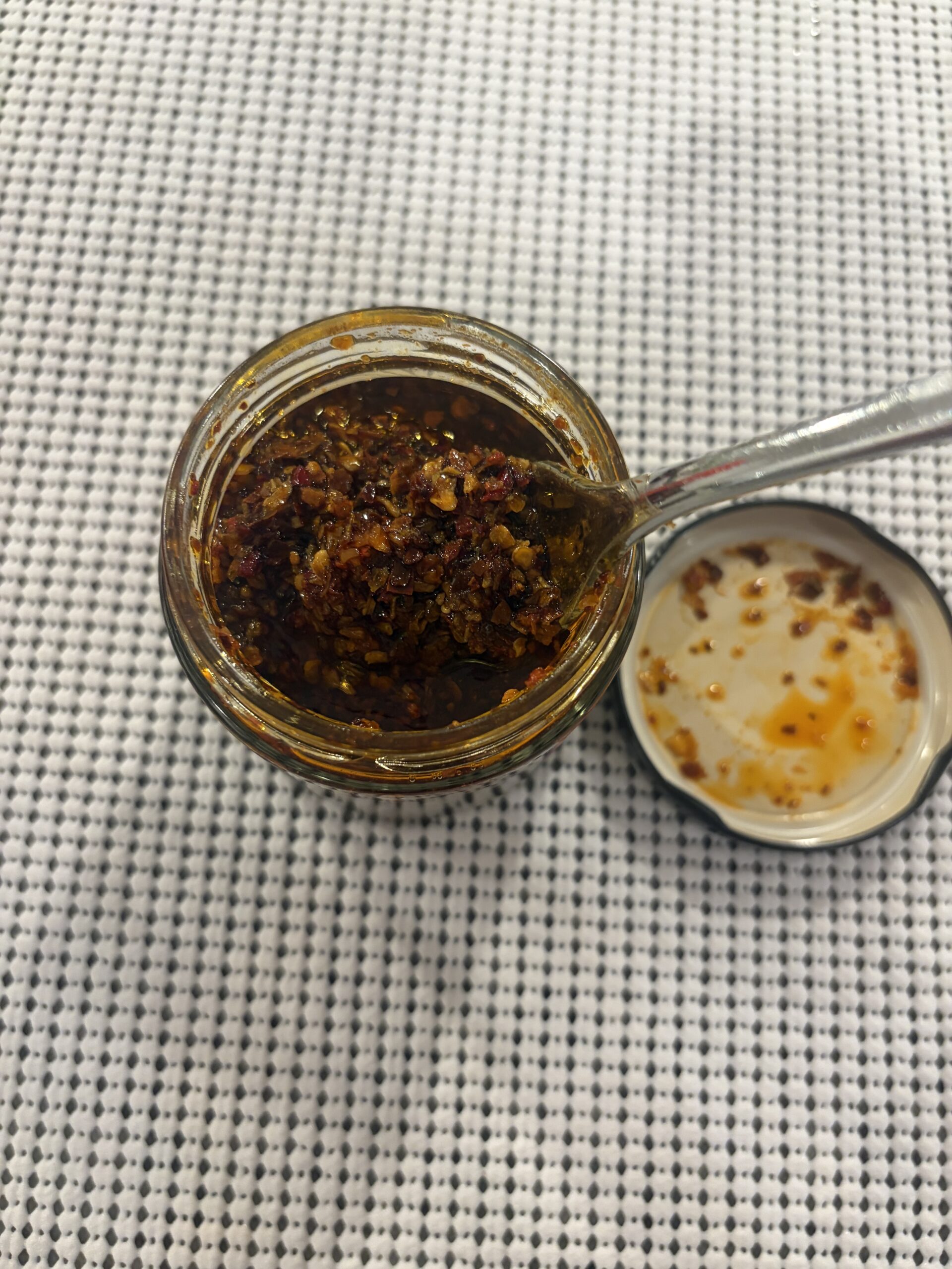 Sabatino Calabrian Truffle Crunch after stirring showing texture — Flavor Index Lab