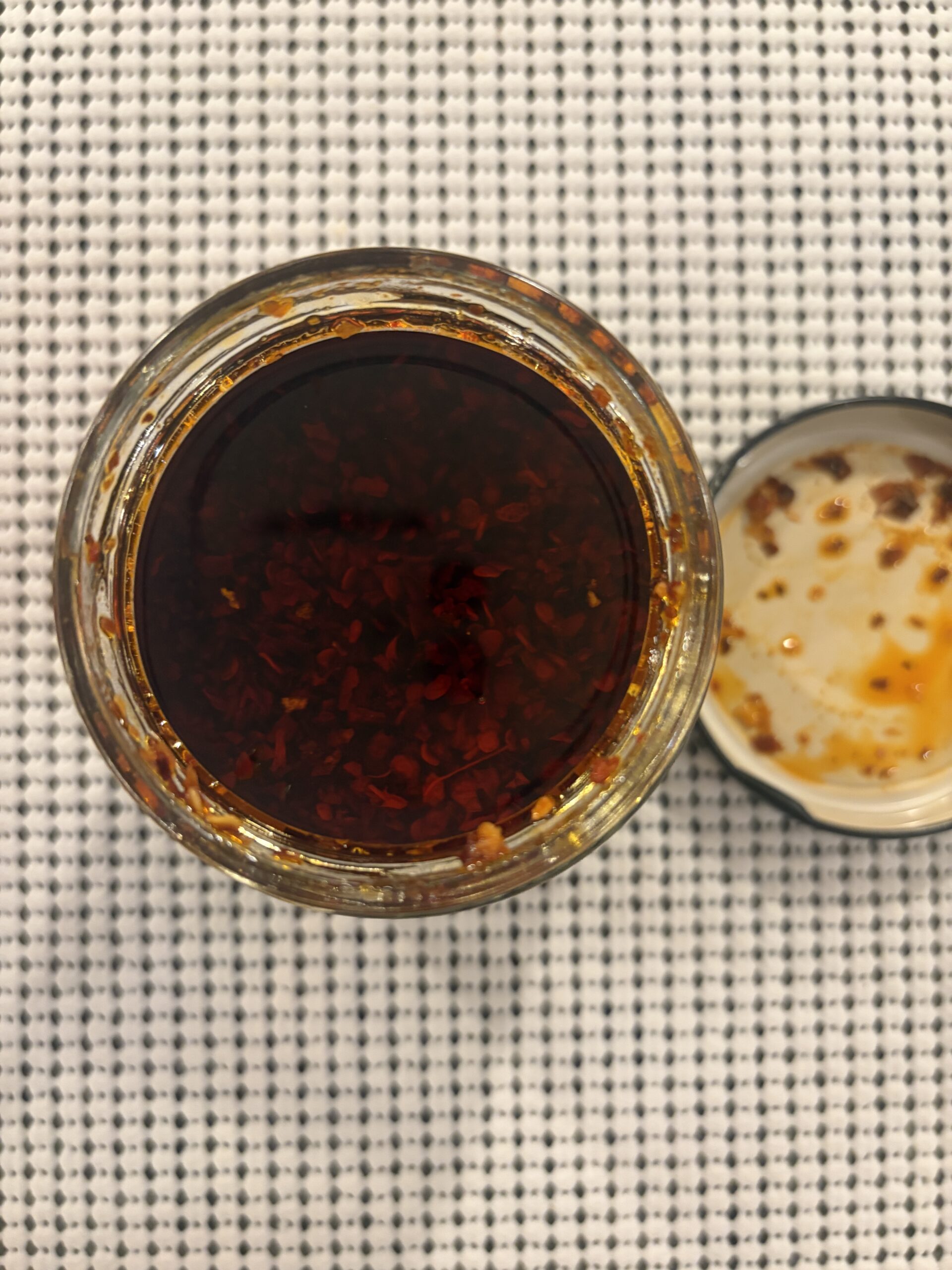 Sabatino Calabrian Truffle Crunch open jar showing bits and truffle flakes — Flavor Index Lab