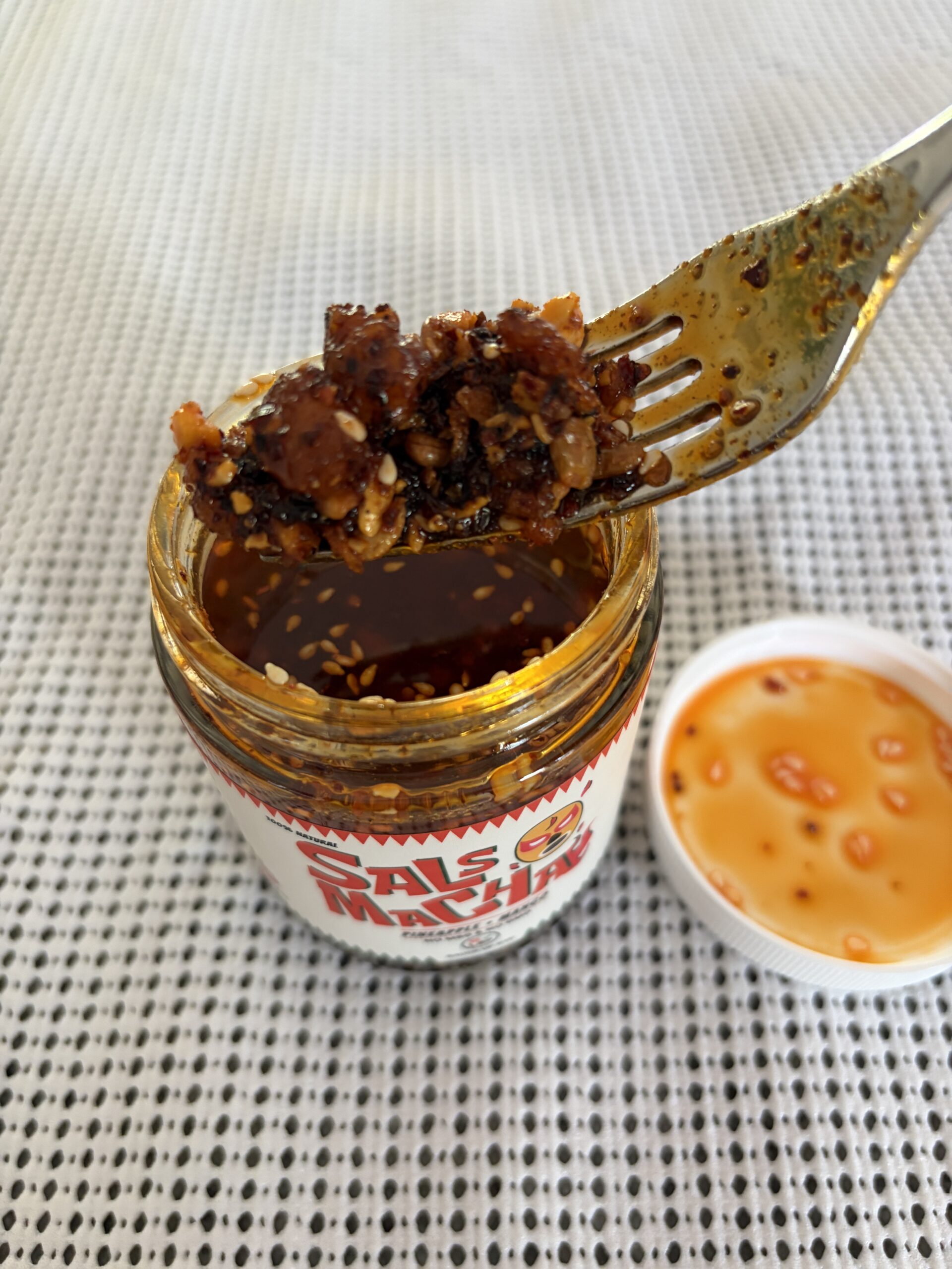 Sauce Up Pineapple Mango salsa macha fork pull with peanuts and seeds — Flavor Index Lab