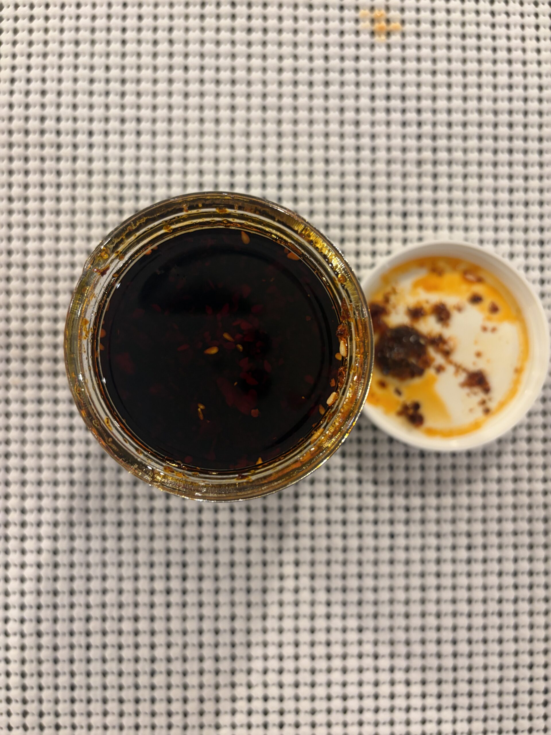 Sauce Up White Truffle chili crisp open jar with sesame seeds and fried garlic — Flavor Index Lab
