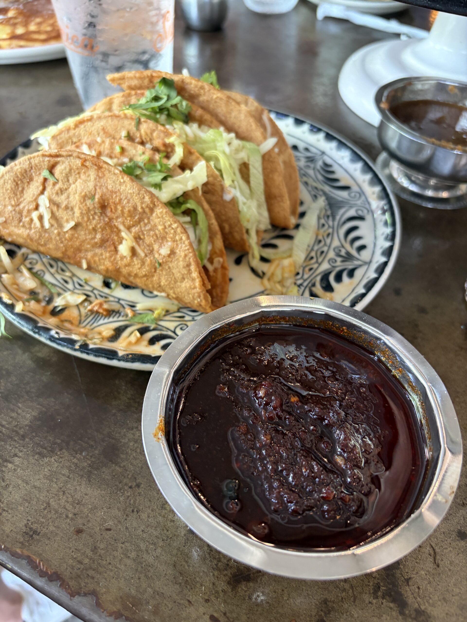 Superica Krog Street Salsa Macha Review — Superica Krog Street salsa macha served tableside in a metal bowl — Flavor Index Lab