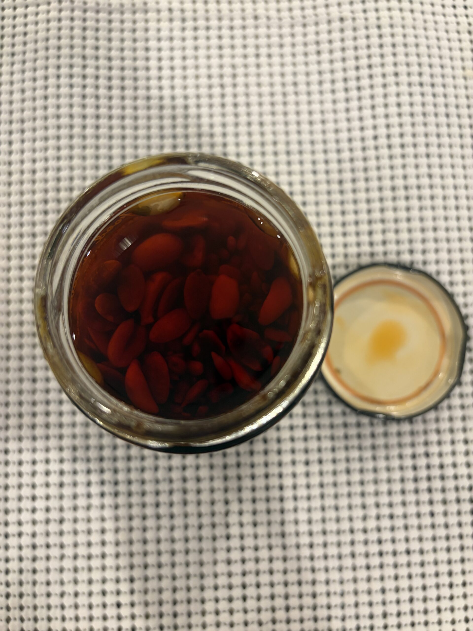 Tia Lupita Savory Peanut salsa macha open jar showing peanuts and seeds — Flavor Index Lab