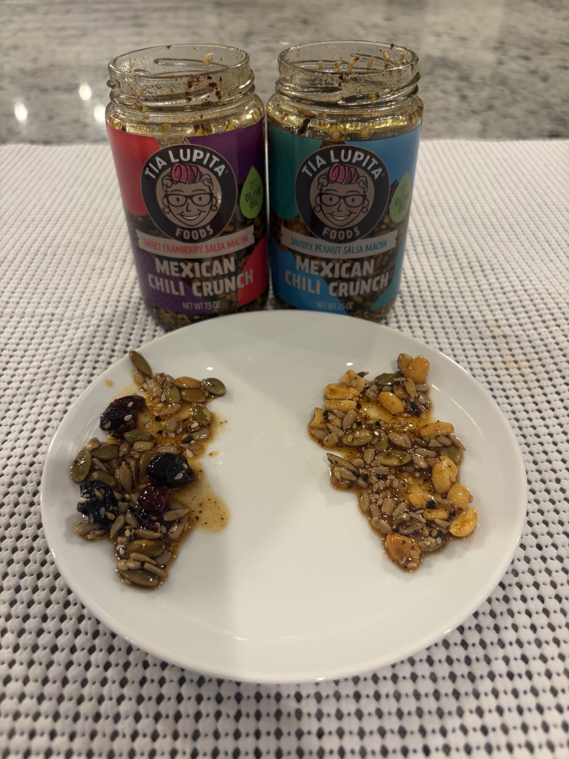 Tia Lupita salsa macha cranberry and peanut variants plated for comparison — Flavor Index Lab