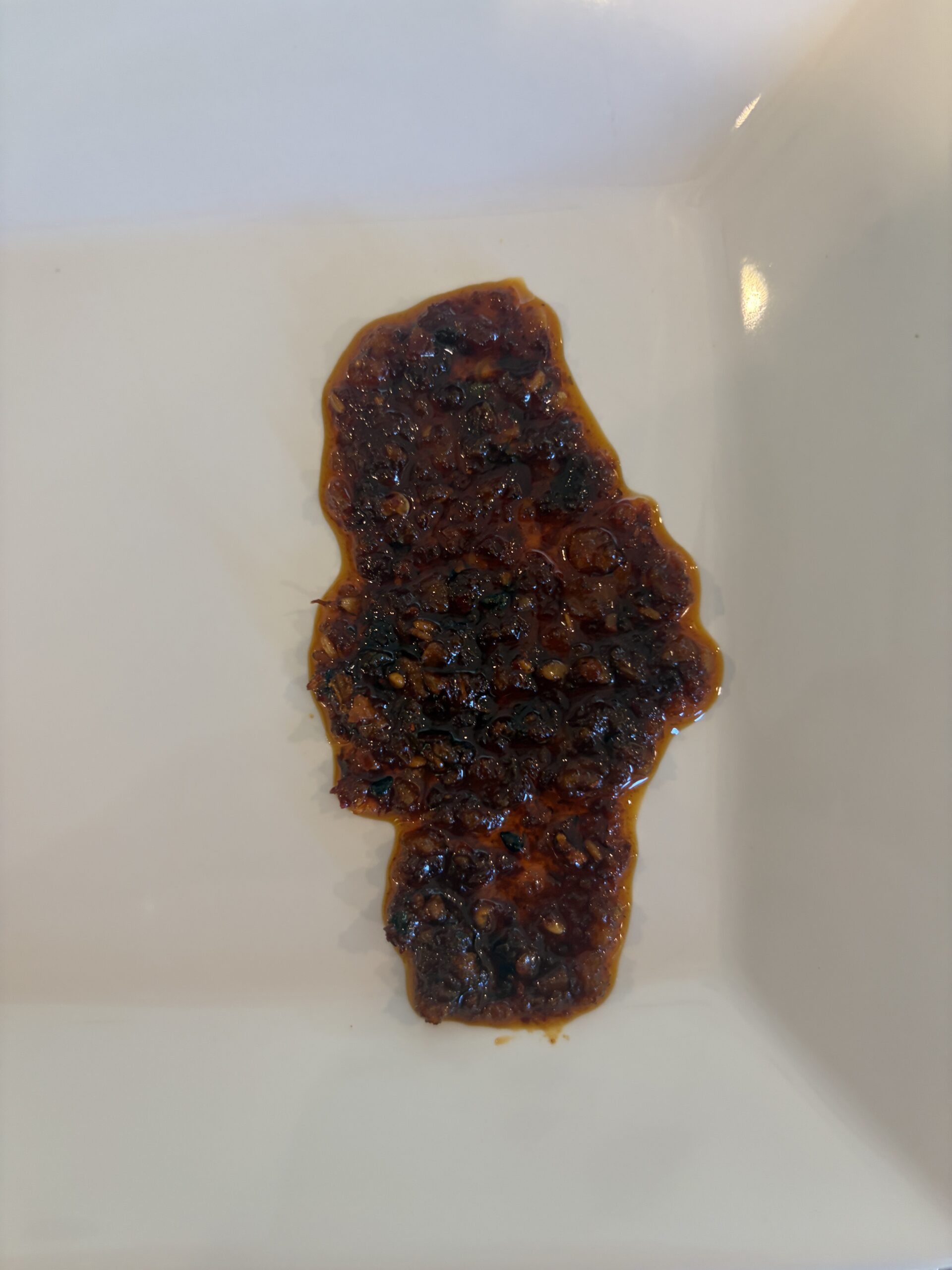 Umami Hottie Sweet Heat chili oil plated — Flavor Index Lab