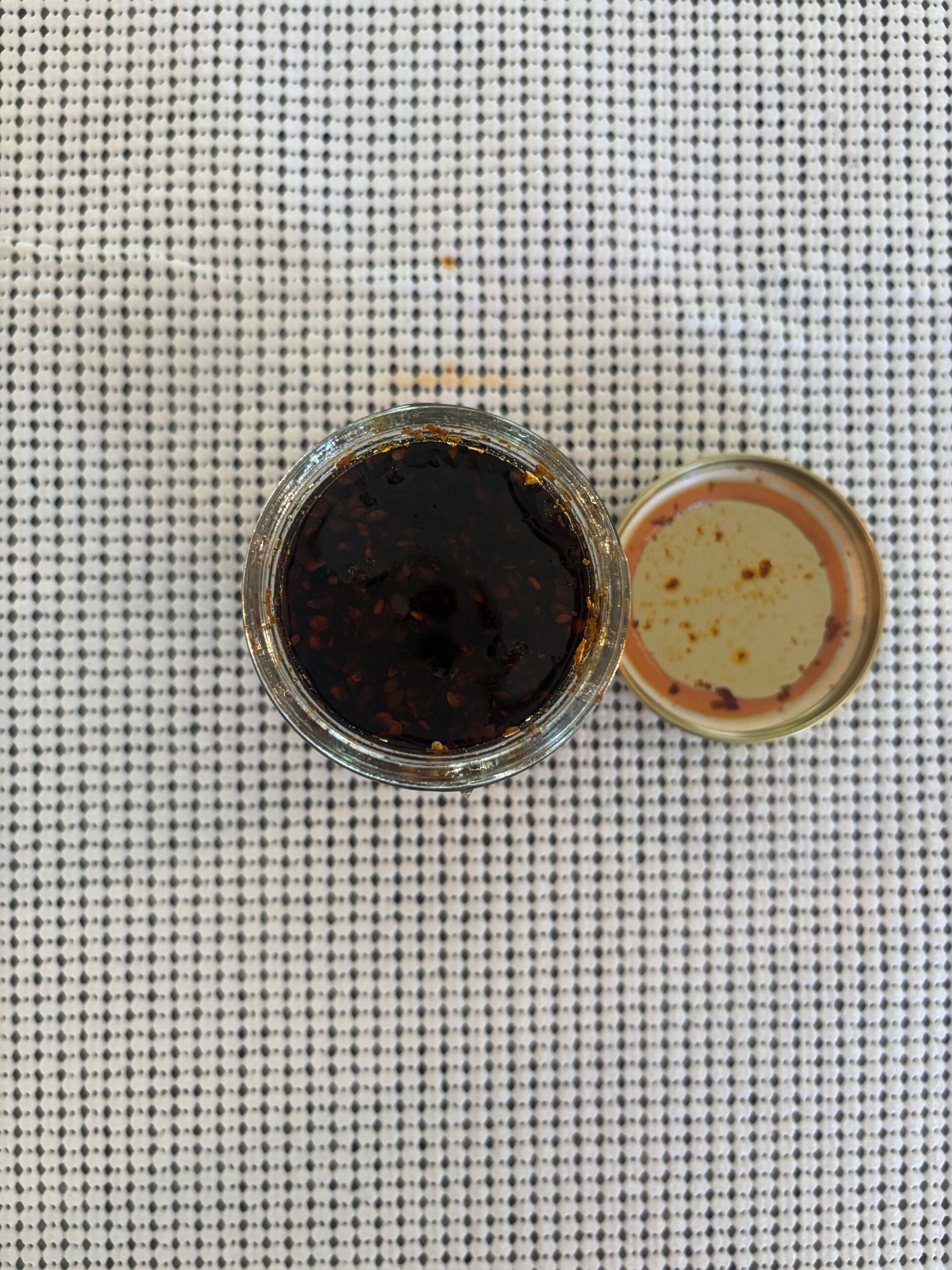 Umami Hottie Original Heat chili oil open jar showing paste-like texture — Flavor Index Lab