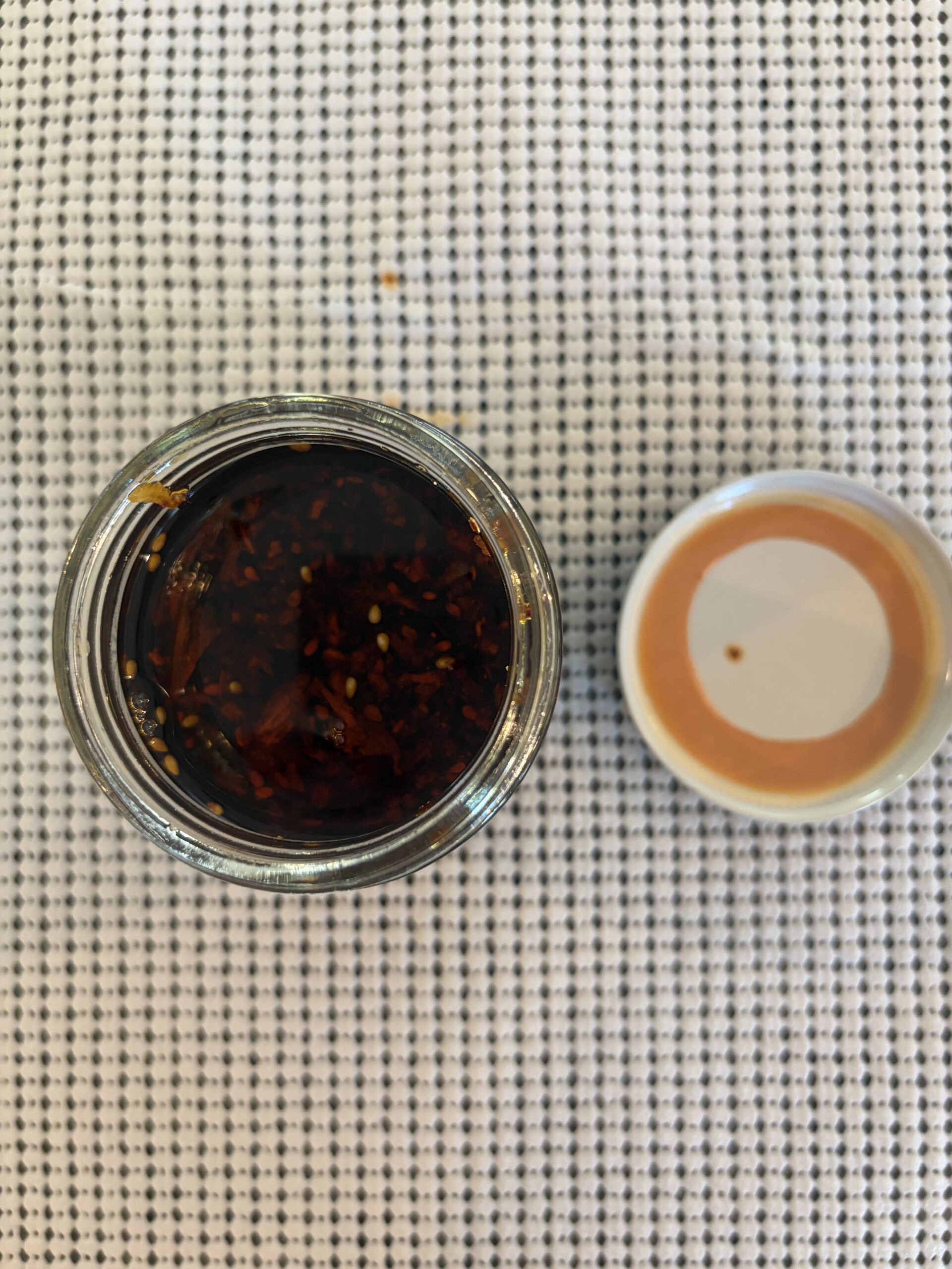 Umami Hottie chili oil open jar showing garlic and chili bits — Flavor Index Lab