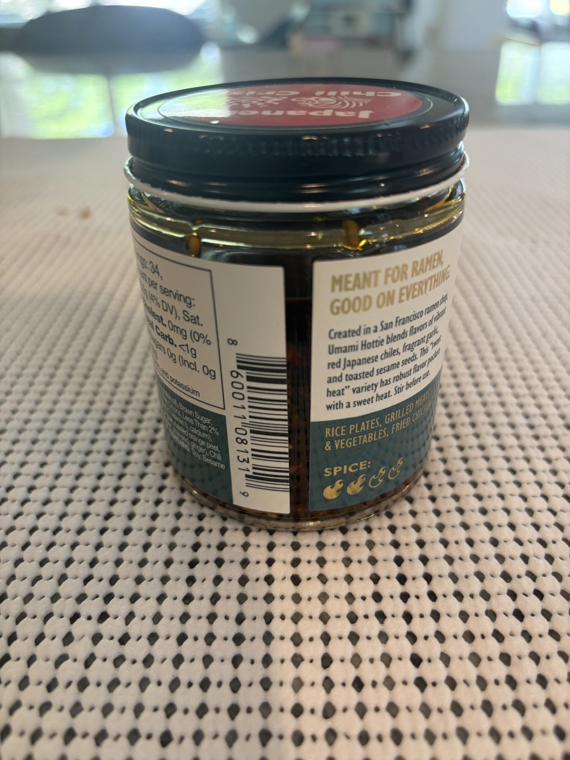 Umami Hottie Sweet Heat chili oil settlement showing solids and oil layers — Flavor Index Lab