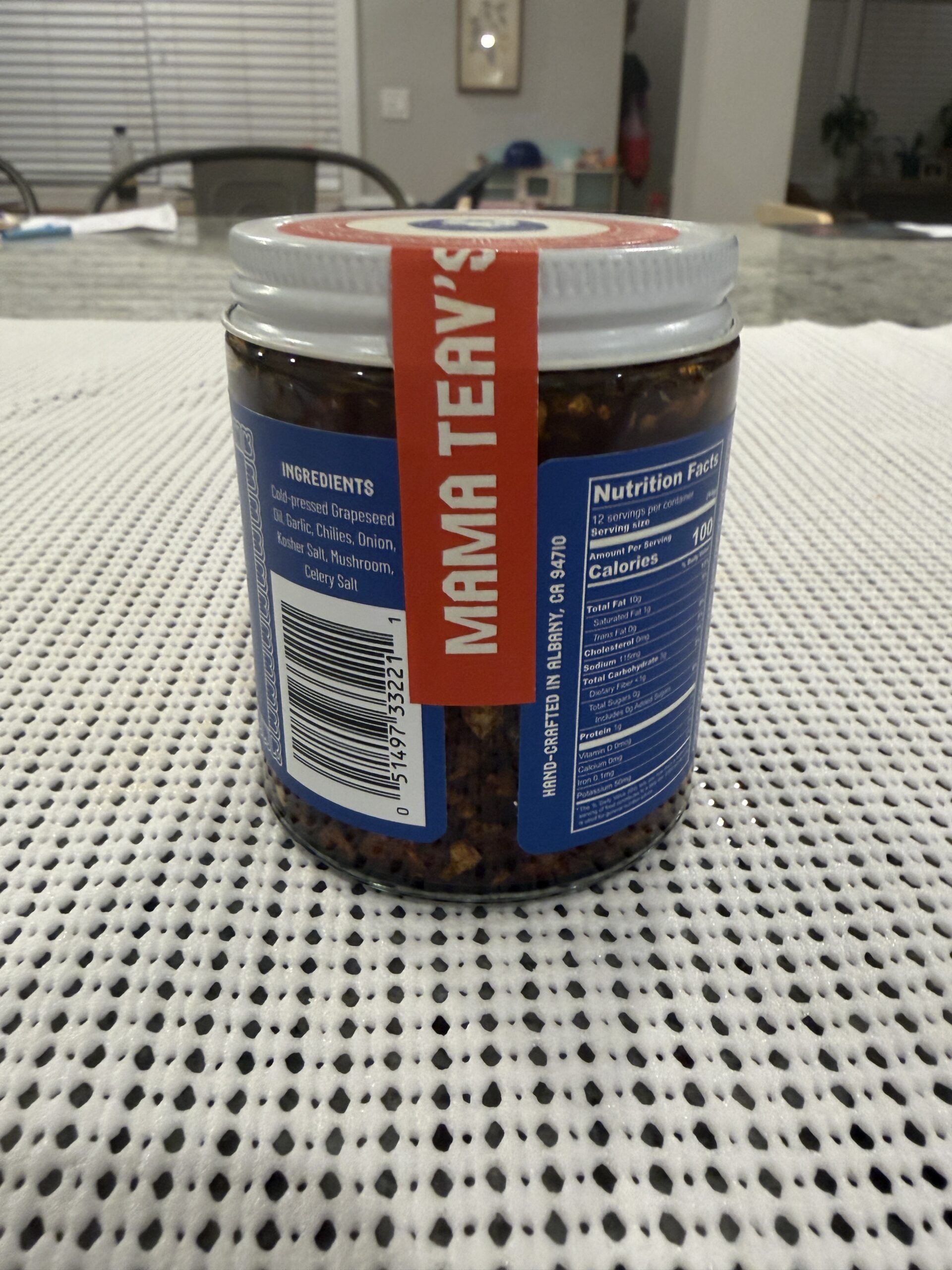 Mama Teav's Mild chili crisp settlement showing solids and oil separation — Flavor Index Lab