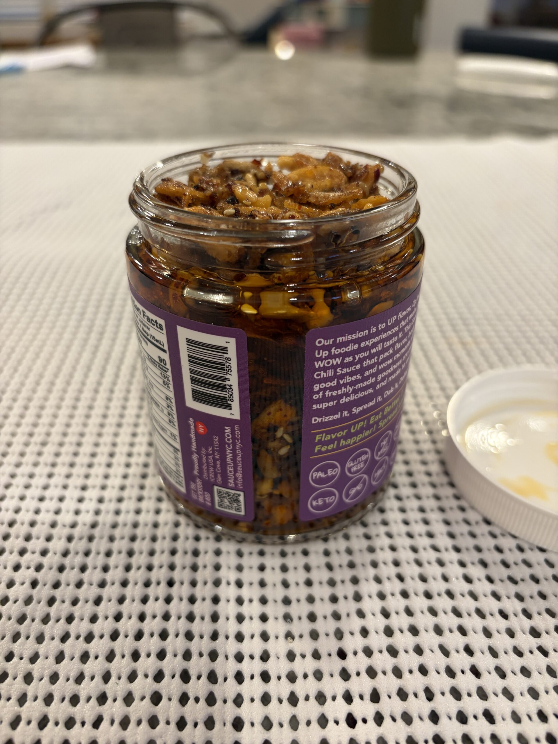 Sauce Up chipotle garlic chip settlement showing packed bits — Flavor Index Lab