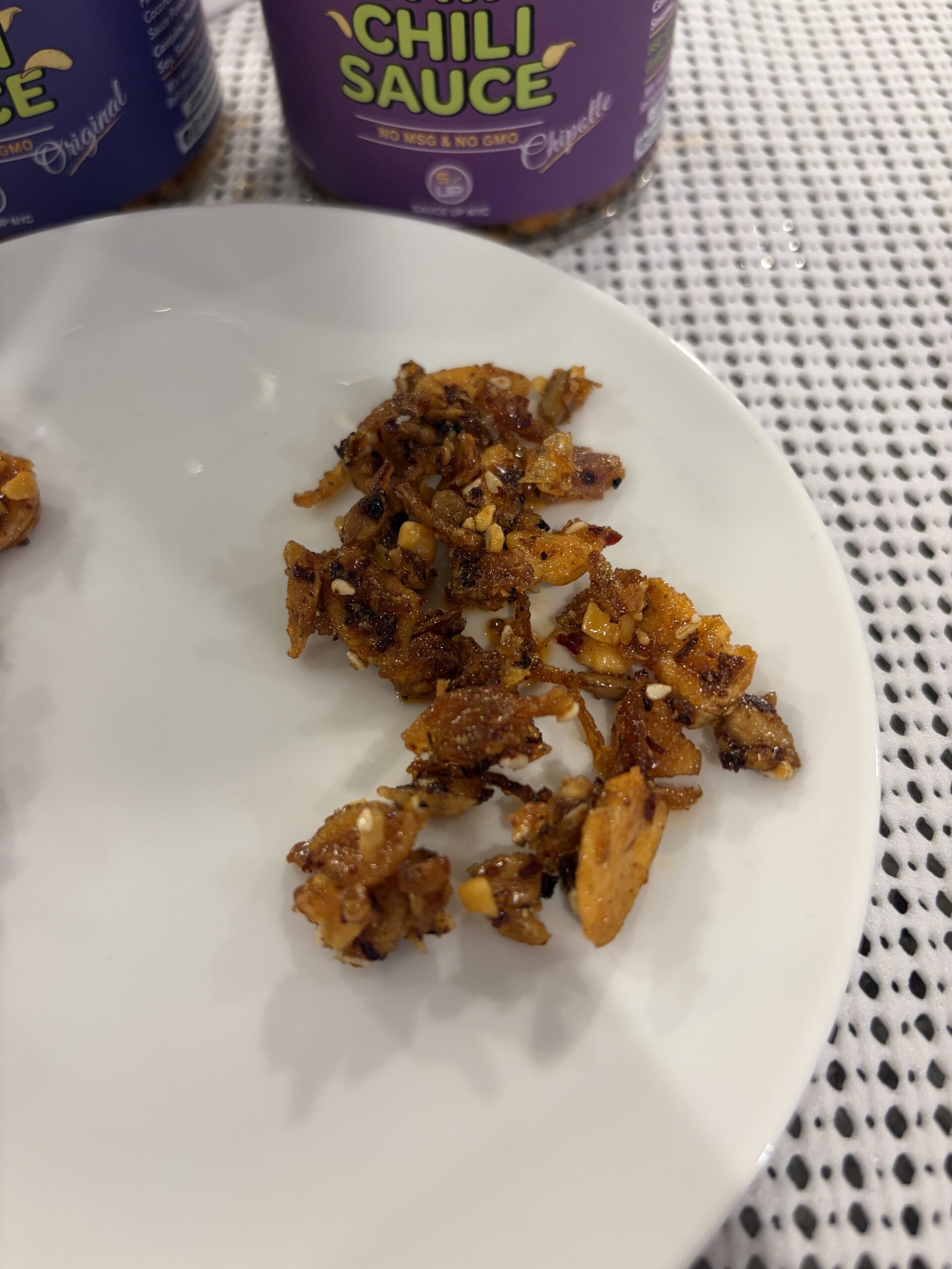 Sauce Up NYC garlic chip Chipotle plated showing smoky chili bits — Flavor Index Lab
