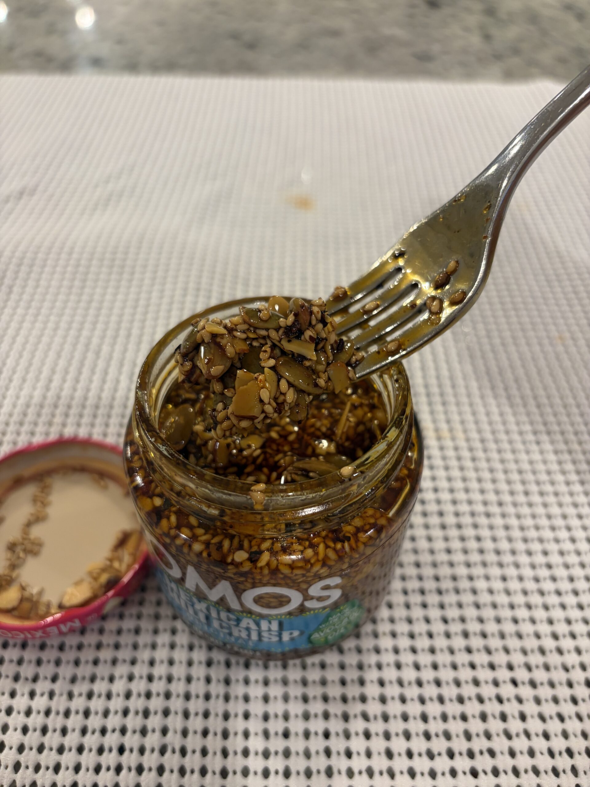 SOMOS chili crisp fork pull with seeds and avocado oil — Flavor Index Lab