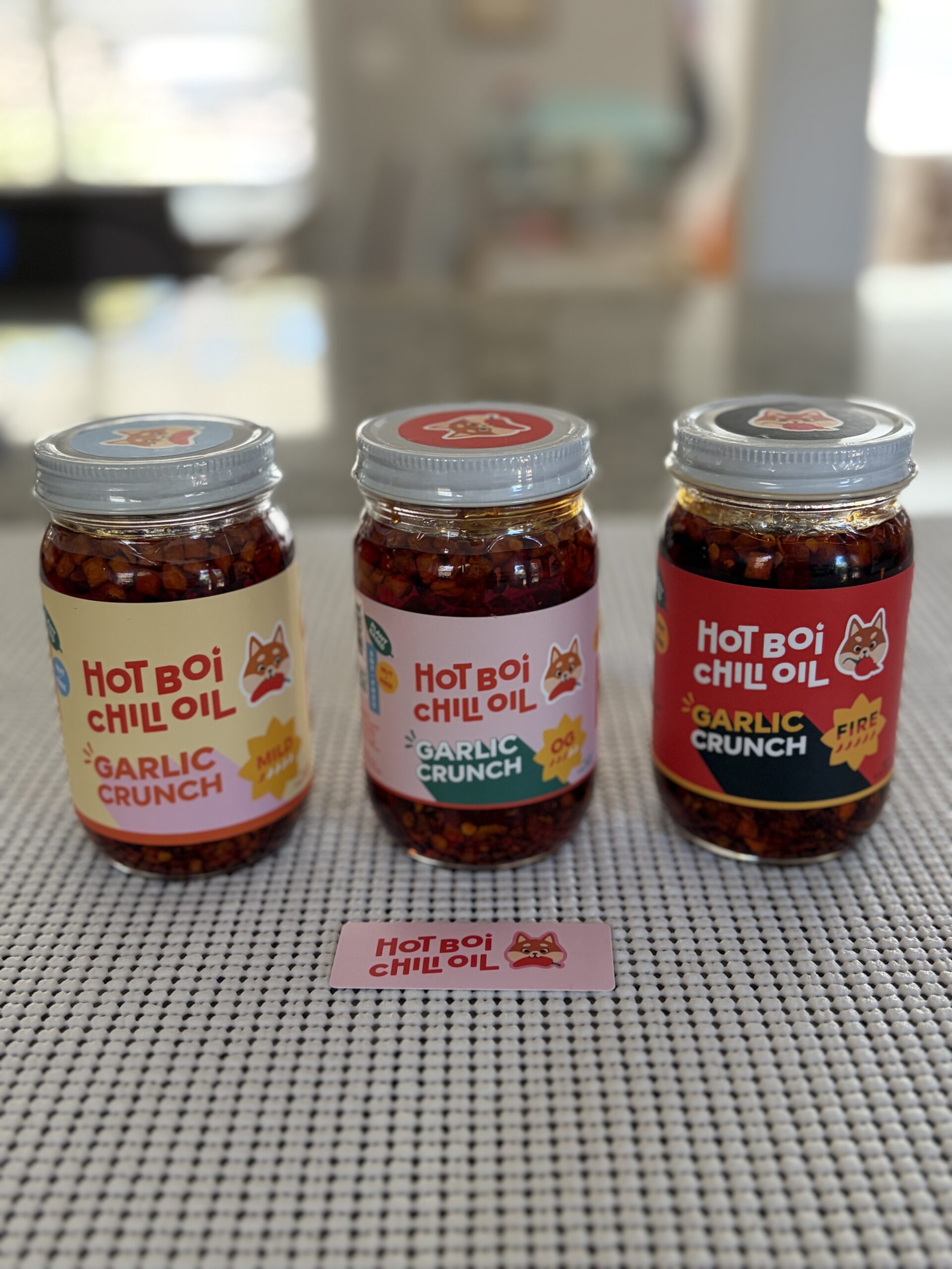 Hot Boi Chili Oil review — Mild, OG, and Fire Garlic Crunch jars together — Flavor Index Lab