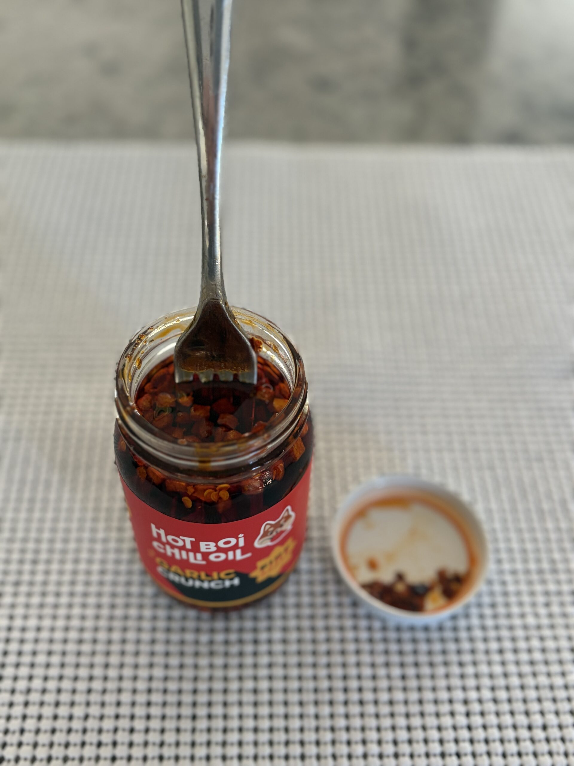 Hot Boi Chili Oil Fire open jar with fork, before stirring — Flavor Index Lab