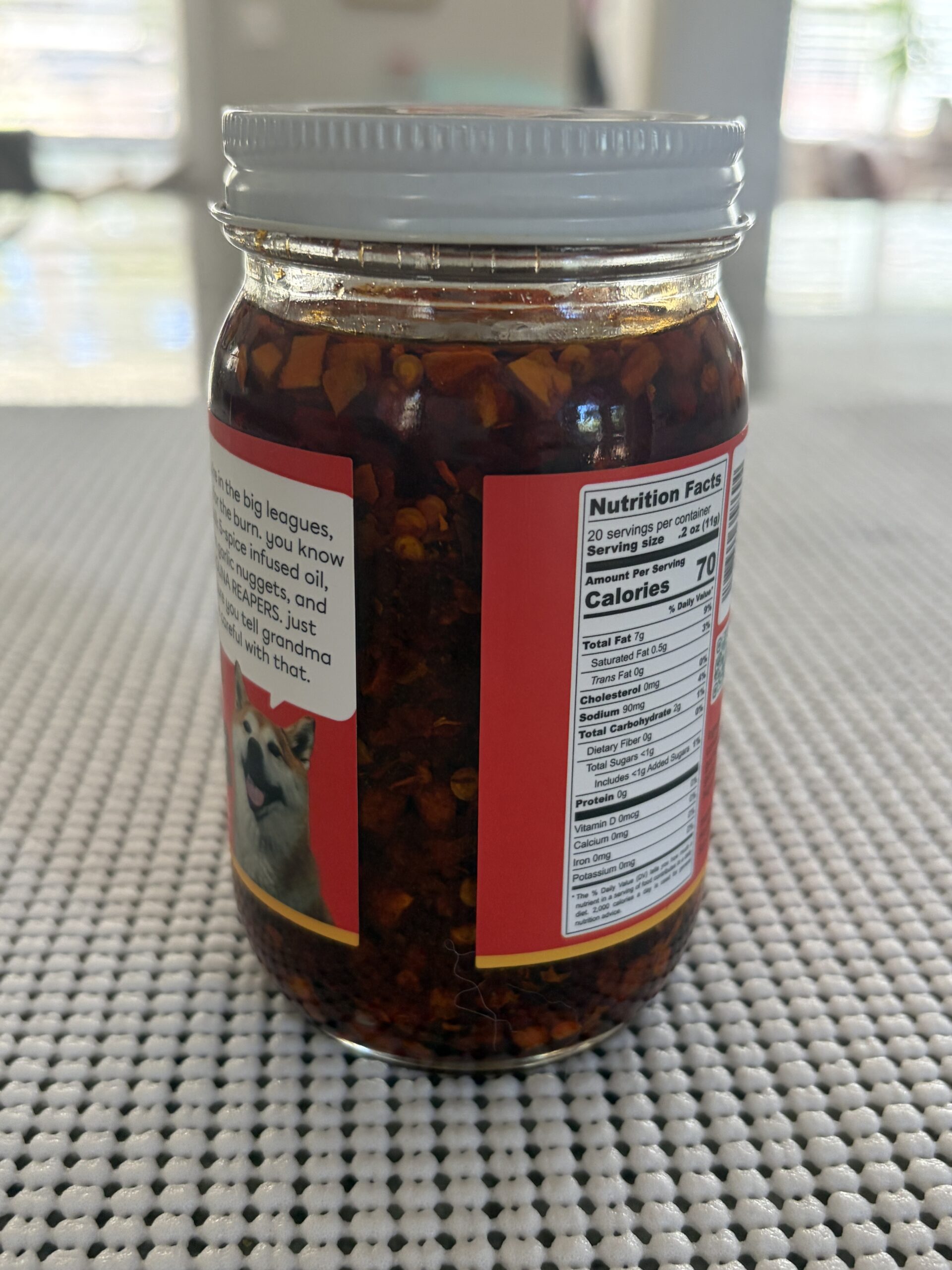 Hot Boi Chili Oil Fire settlement showing solids about 90 percent up the jar — Flavor Index Lab