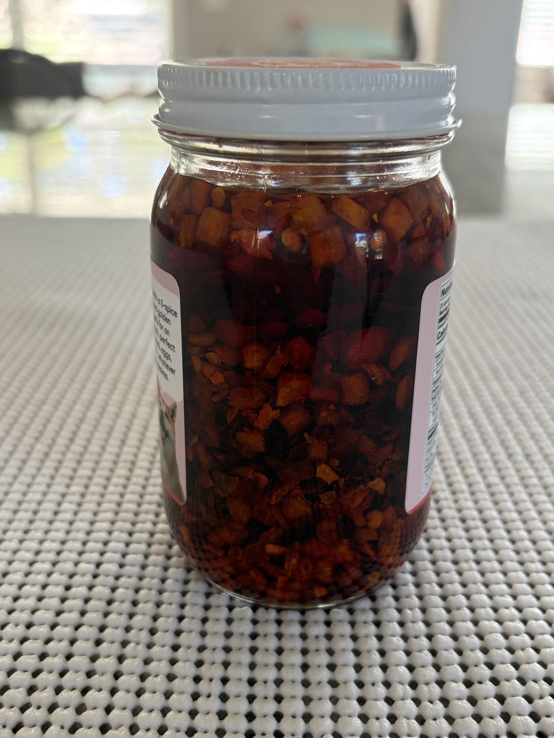 Hot Boi Chili Oil OG settlement showing solids about 80 percent up the jar — Flavor Index Lab